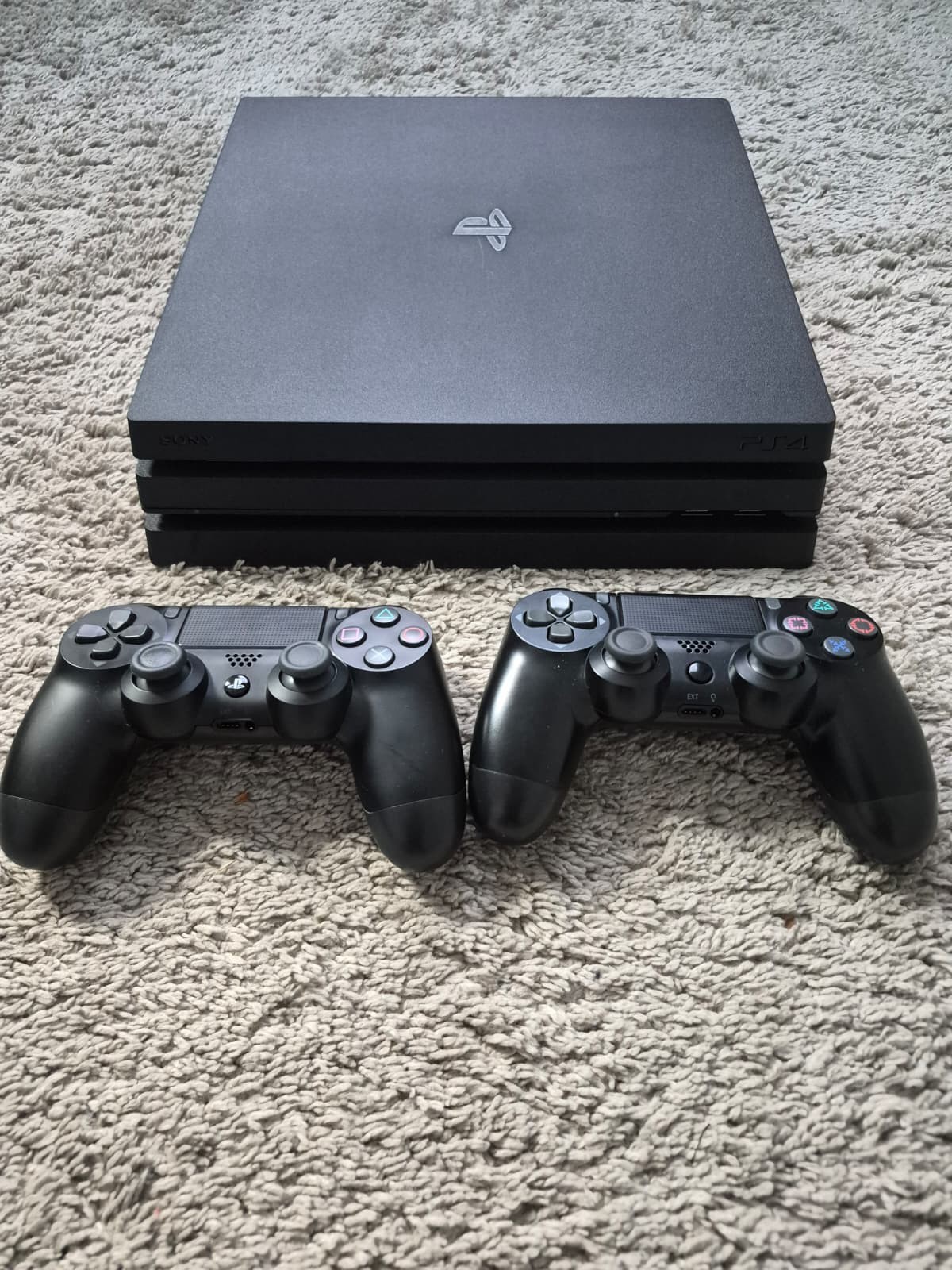 PS4 Pro 1TB with 2 DualShock controllers great condition