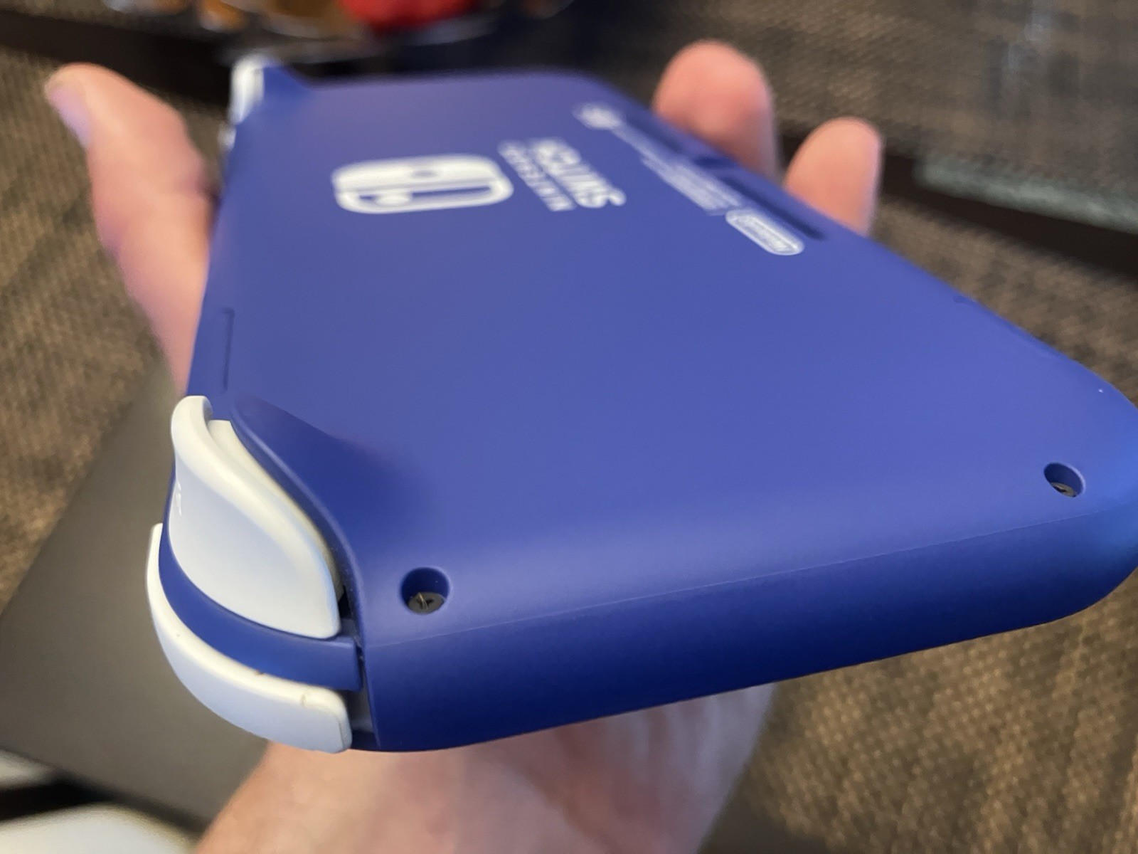 Used Switch Lite in Purple