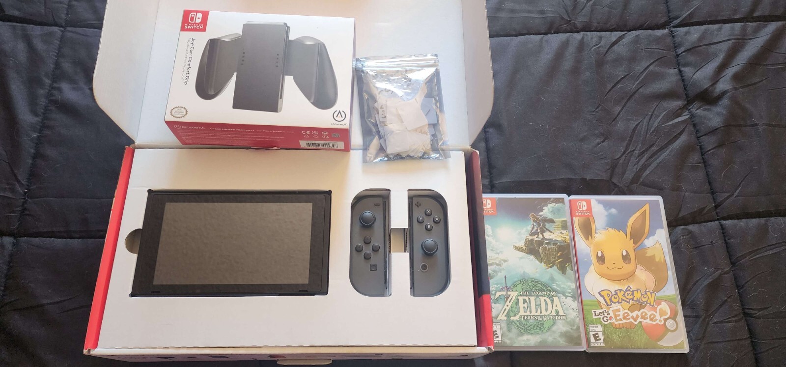 Nintendo Switch In Box – With Tears of the Kingdom and Pokemon: Lets GO Eevee