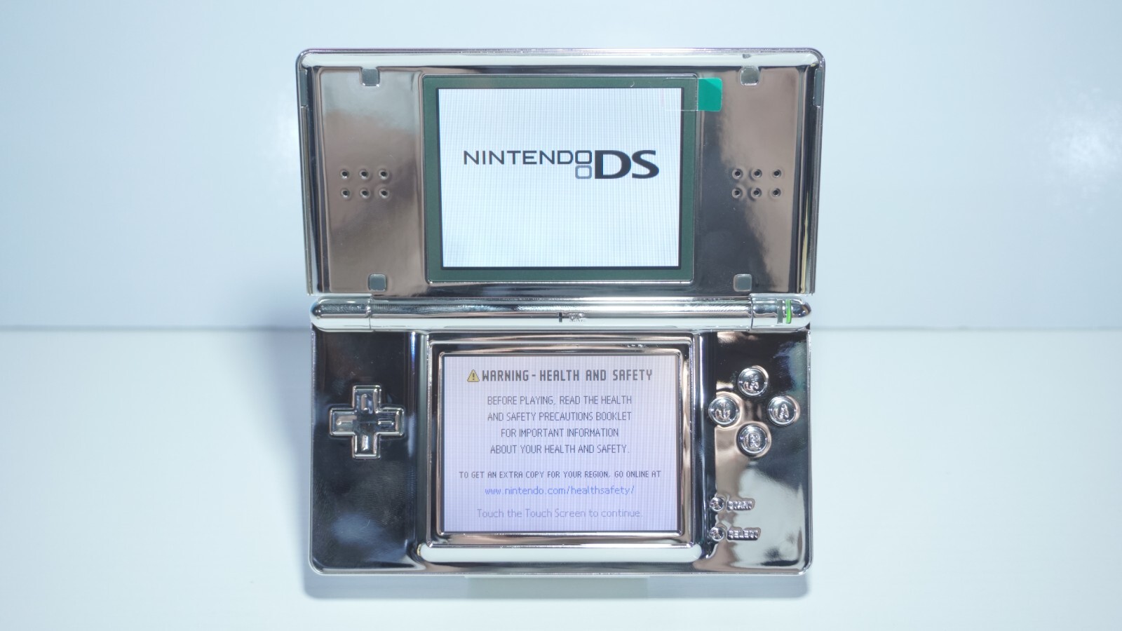 Nintendo DS Lite Metallic Chrome Silver Mirror Handheld Game System w/ Charger