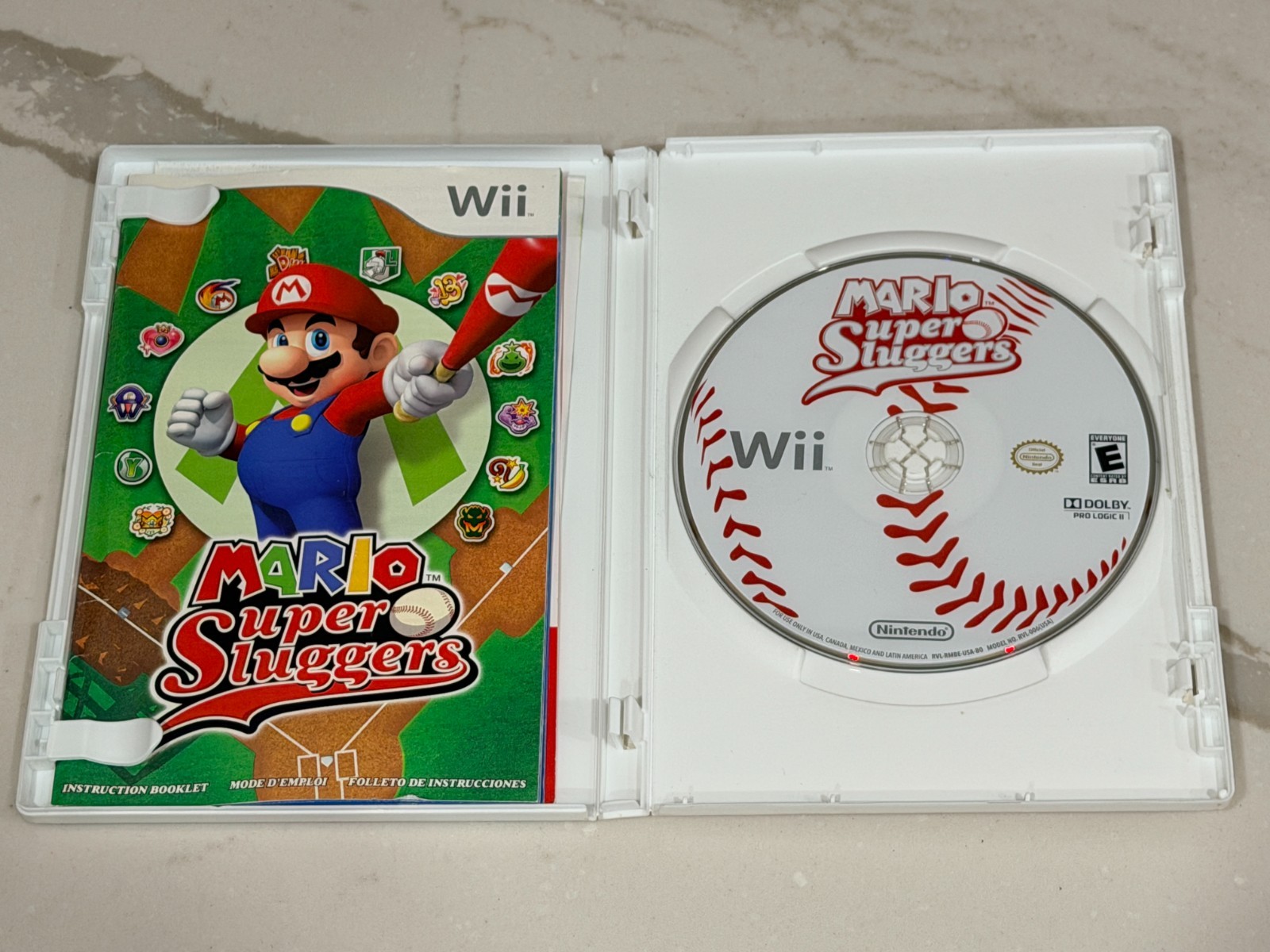 Nintendo Wii Console with Wii Remote, Nunchuck, Wires, Super Mario Sluggers Game