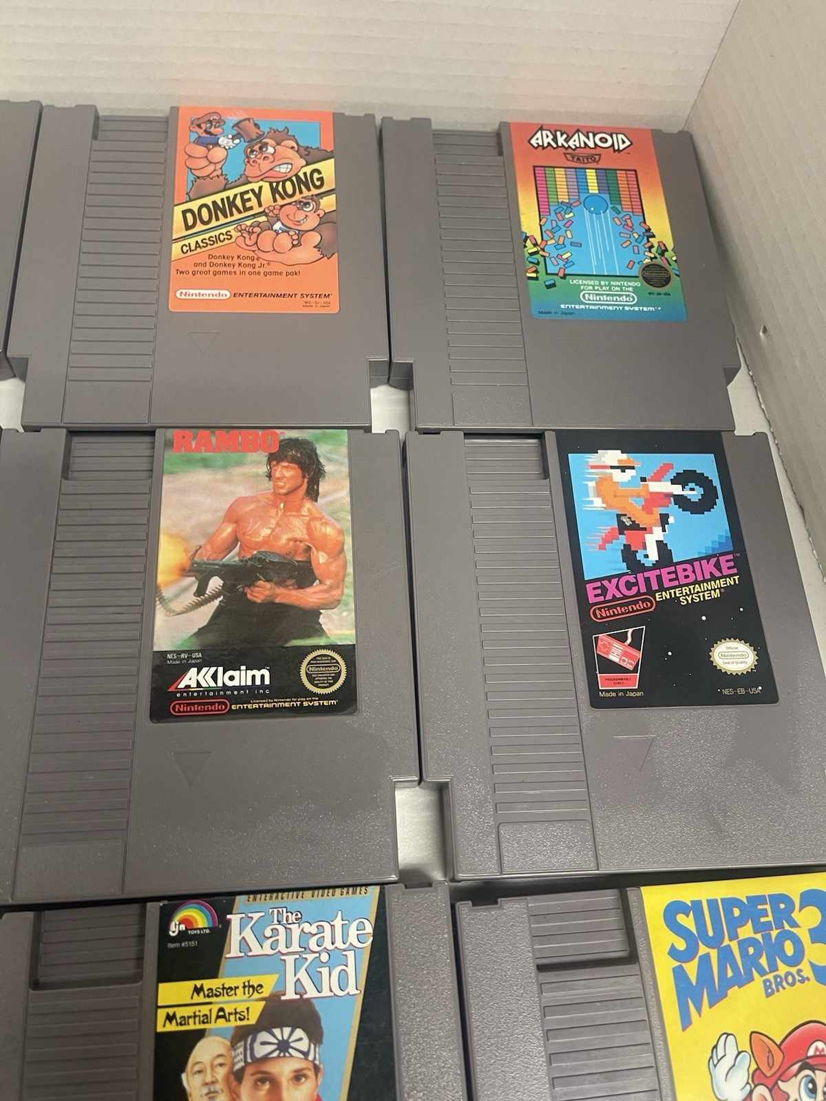 Original Nintendo NES bundle with cords, 2 controllers, zapper, and 17 games