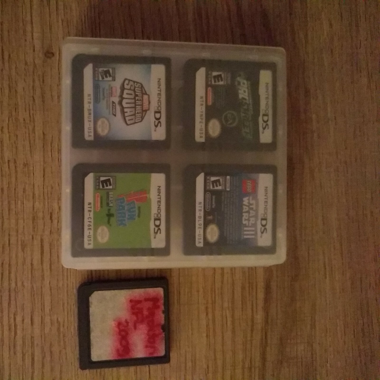 Nintendo DS Lite Handheld Console – Black & Red + 5 games, case, charger, + more