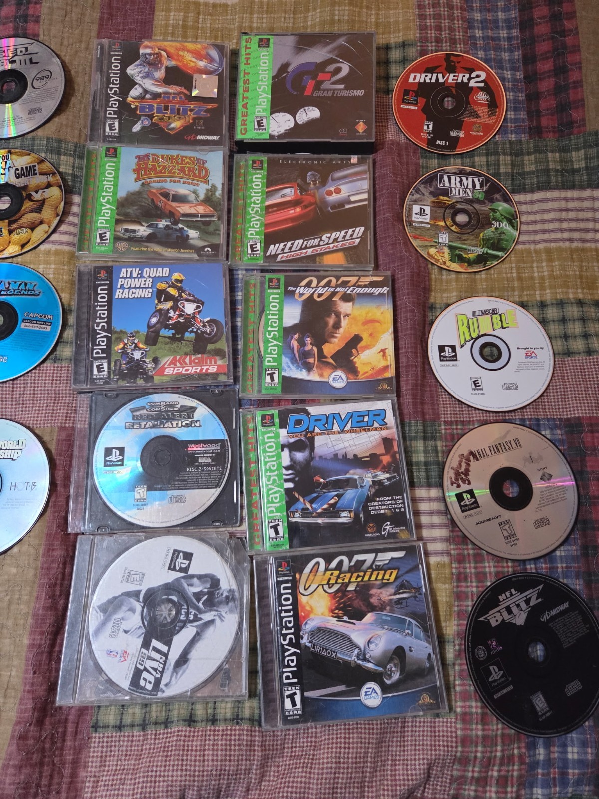 PlayStation 1 with various games tested in working condition has 2 controllers
