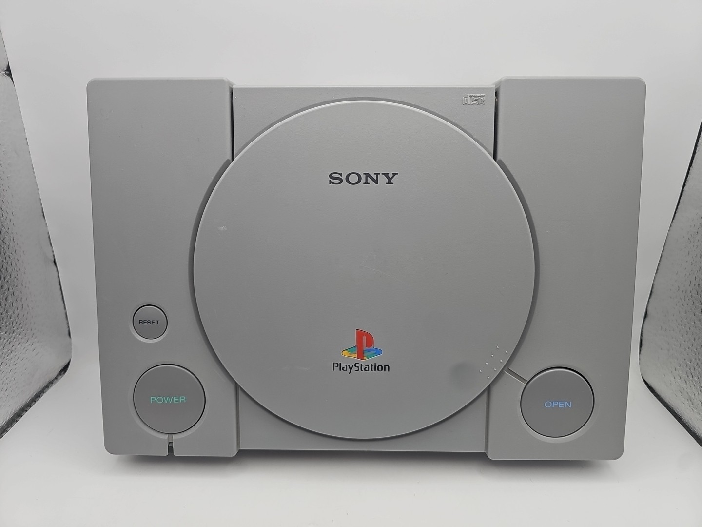 Sony PlayStation Launch Edition Gray Console – W/ 2 Blue Analog Controllers