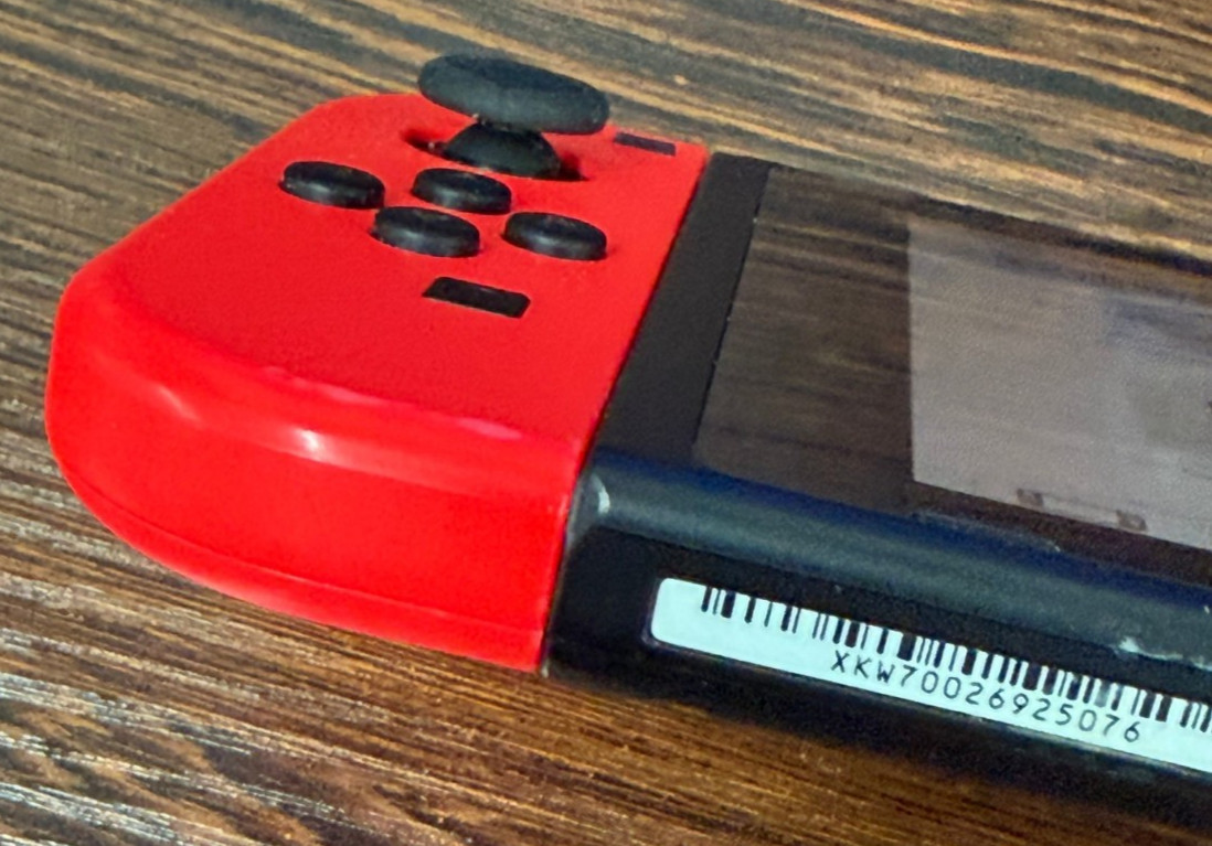 Nintendo Switch Handheld Console – Neon Red JoyCons – Excellent Condition
