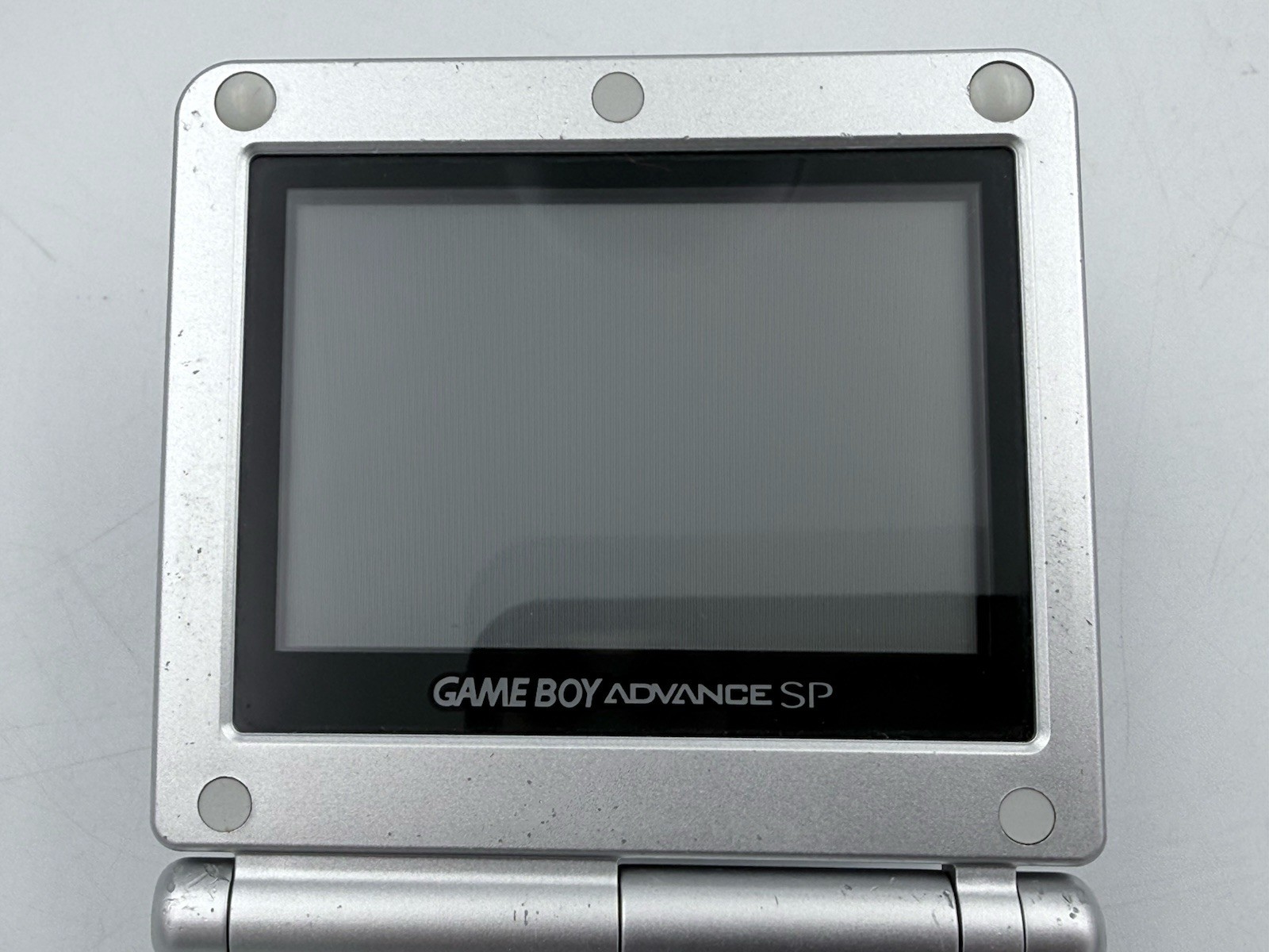 NICE 2002 Nintendo Gameboy Advance SP Silver AGS-001 w/7 Games and Accessories!