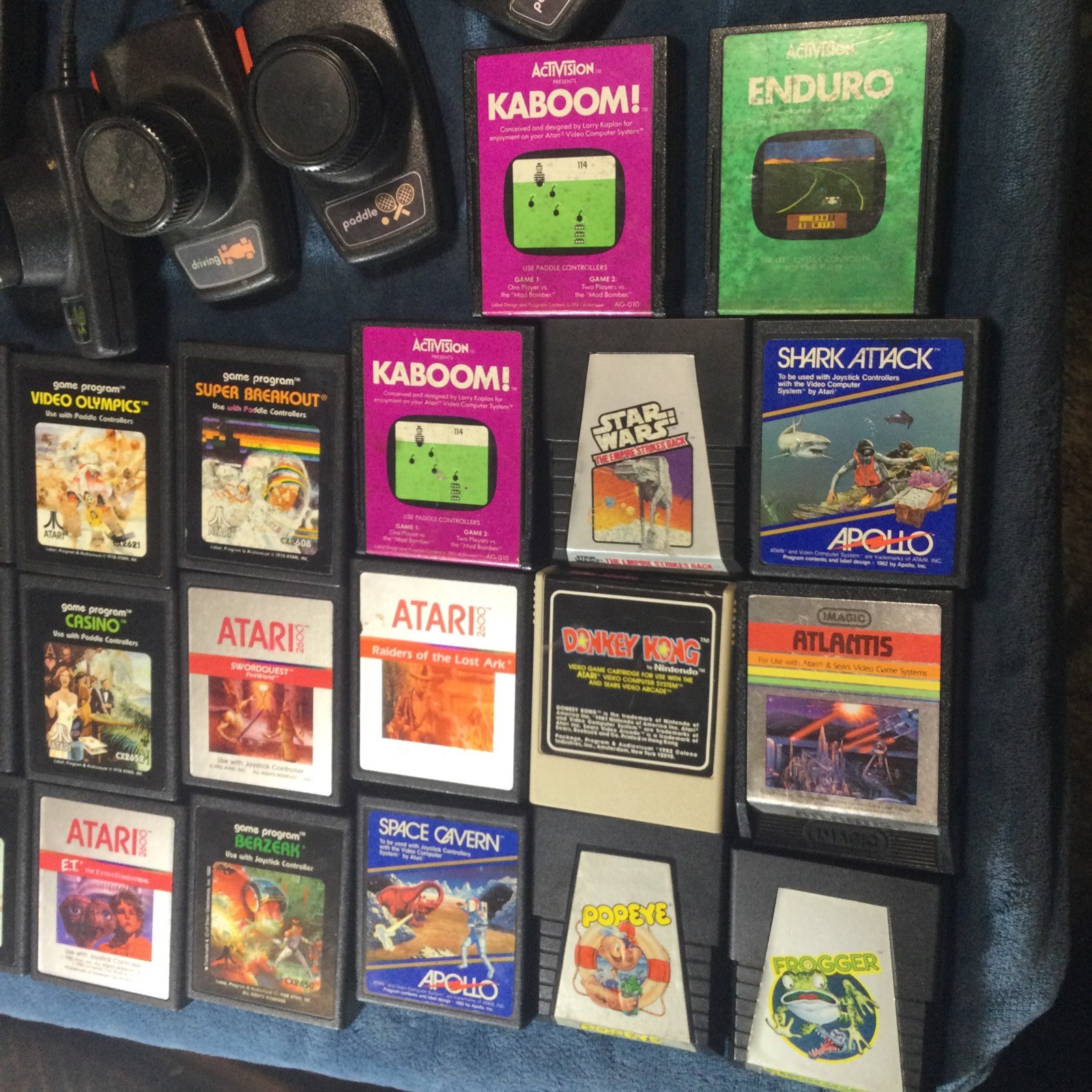LOT(4) ATARI 2600 CONSOLES (42)GAMES (21)CONTROLLERS (4)AC ADAPTERS UNTESTED!!