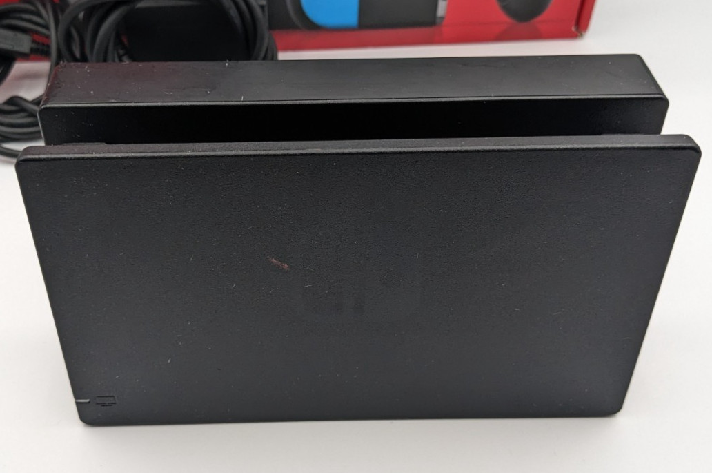 Nintendo Switch Neon Red and Blue Console (in Original Box + all accessories)