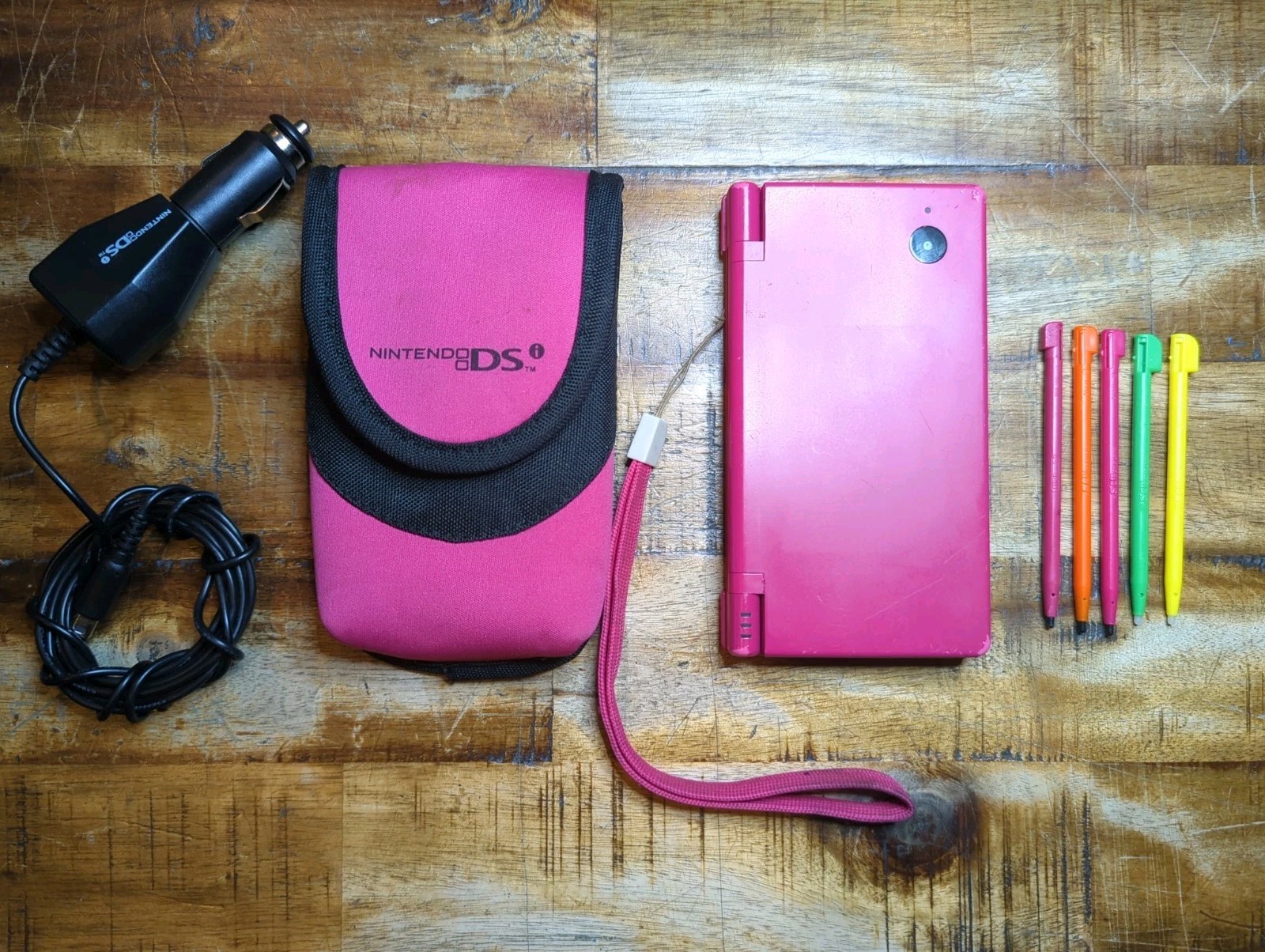 Pink Nintendo DSI Game Console with Case, Charger & Stylus. Won’t Charge