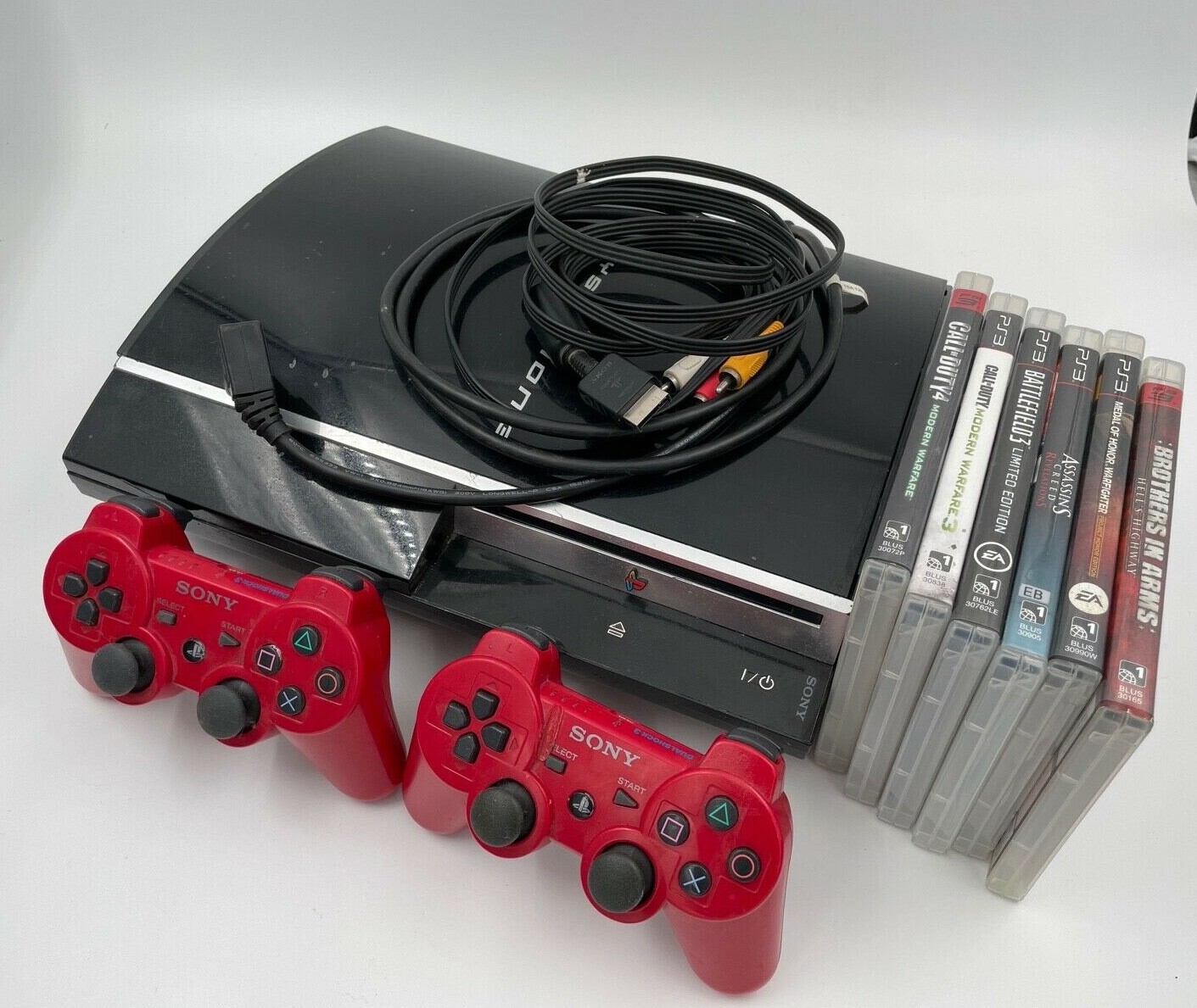 Sony PlayStation 3 80GB Black Console CECHK01 2 controllers and 6 Games!