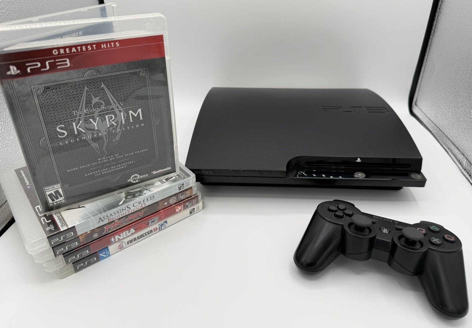 Sony PS3 Slim 120GB SSD Console Bundle Refurbished Arctic MX6 5 Games Dualshock3