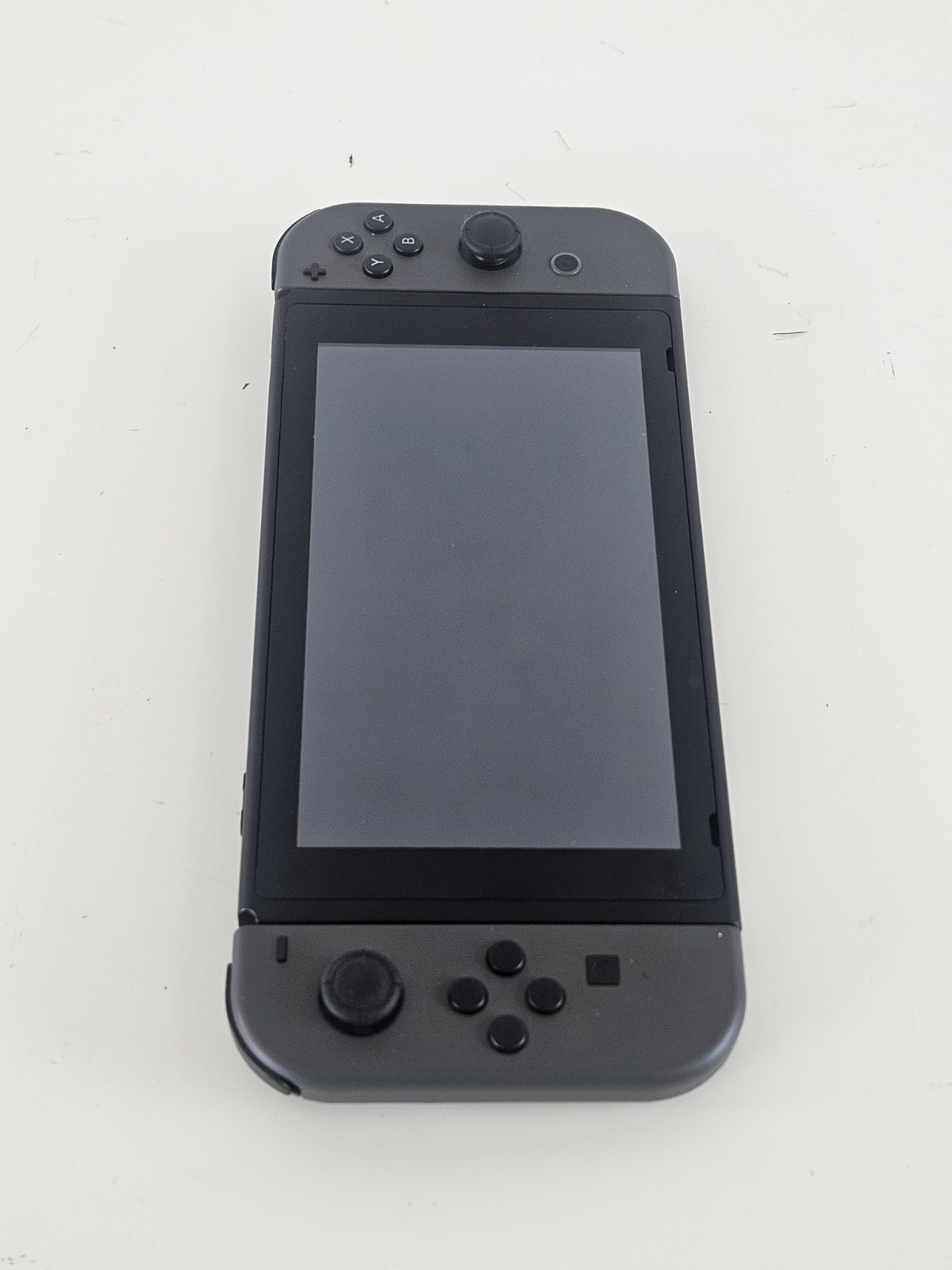 NINTENDO SWITCH HANDHELD – HAC-001 + OEM Charger – Tested