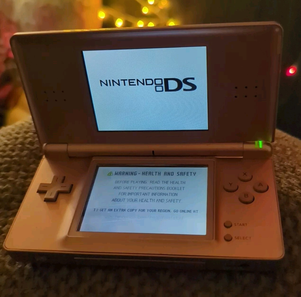 NintendoDSLite-Metallic Rose Gold,No Charger But Charged. Used & Loved.