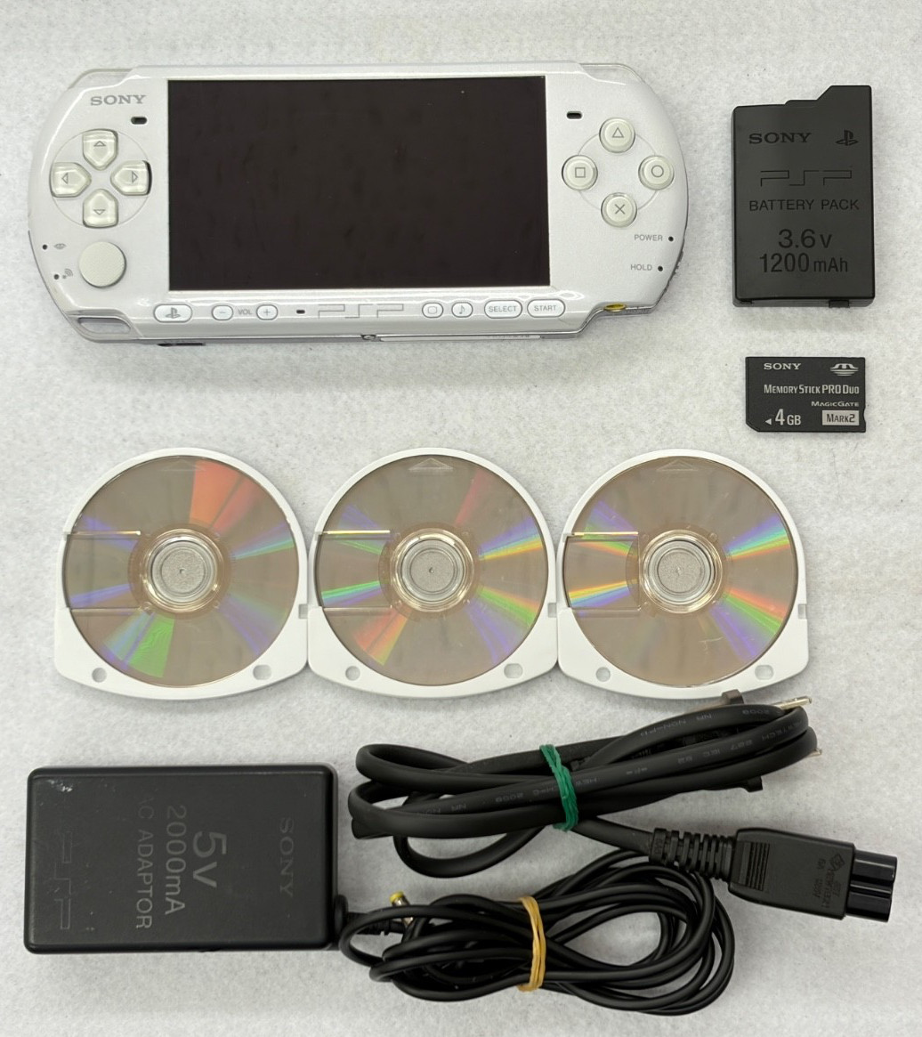 TESTED SONY PSP 3000 SILVER Console + Charger + battery + 3 game Region free 4GB