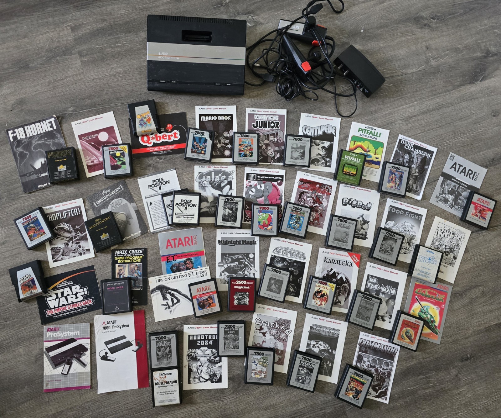 Atari 7800 Video Game Console with 33 games and 2 controllers. Tested + working