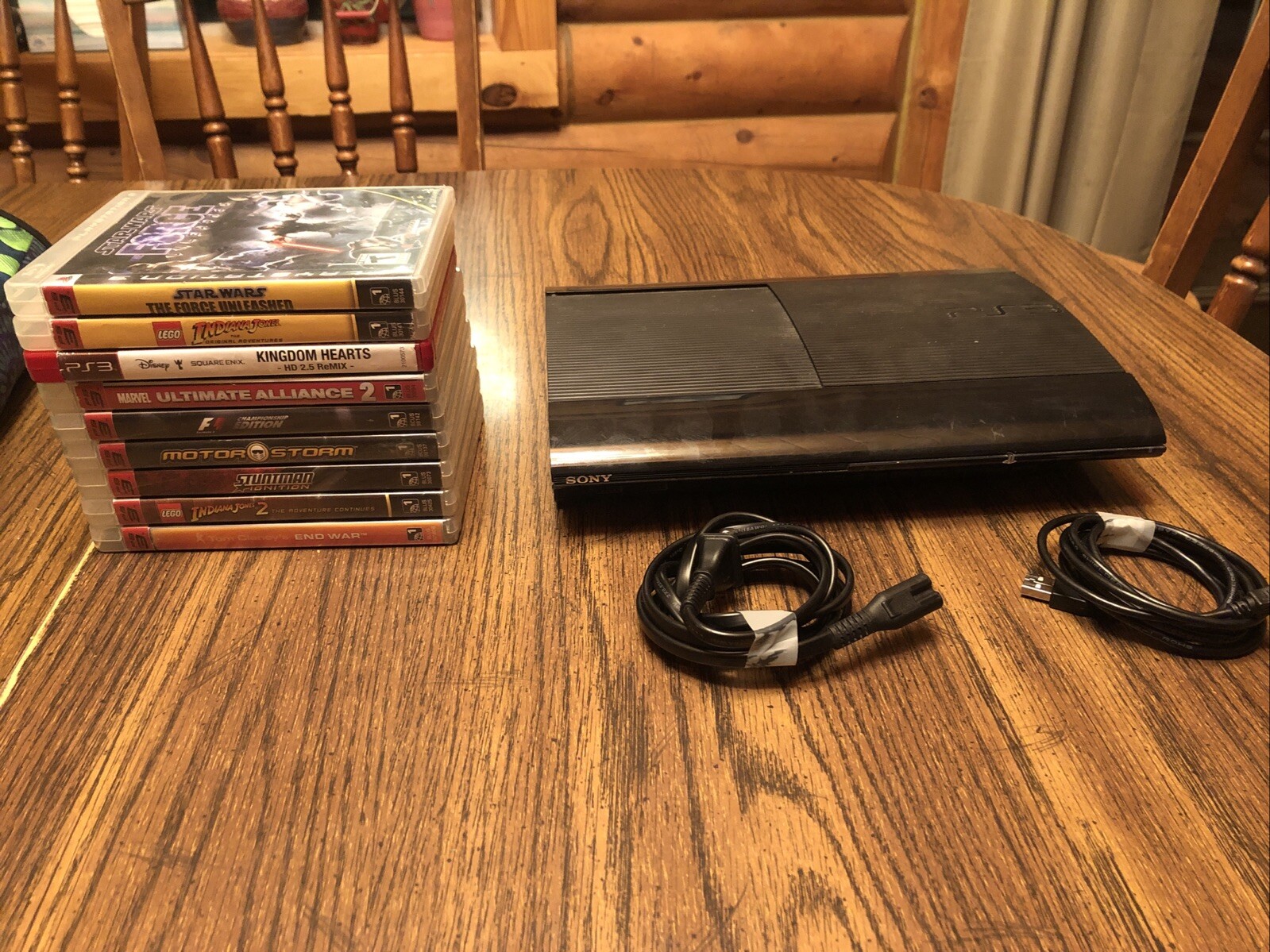 Sony PlayStation 3 Console – Charcoal Black With 10 Games And 2 Controllers