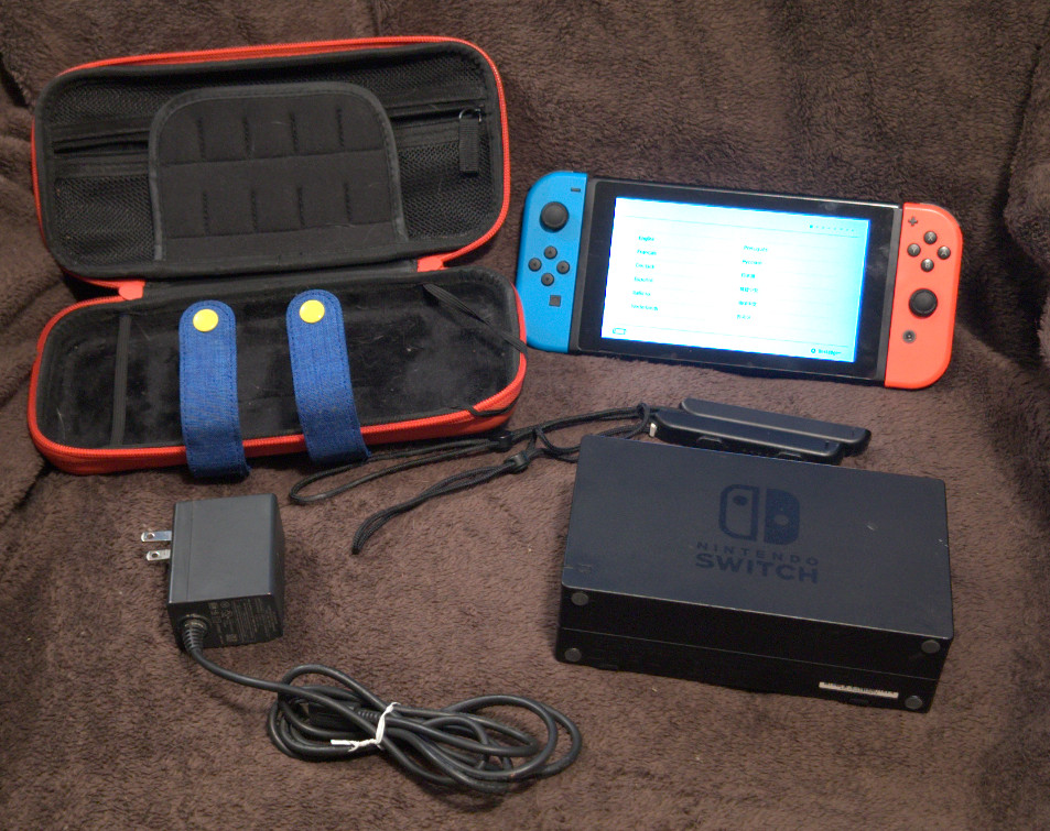 Nintendo Switch (2017) with Joy-cons(Red/Blue), Dock, Adapter and Travel Case