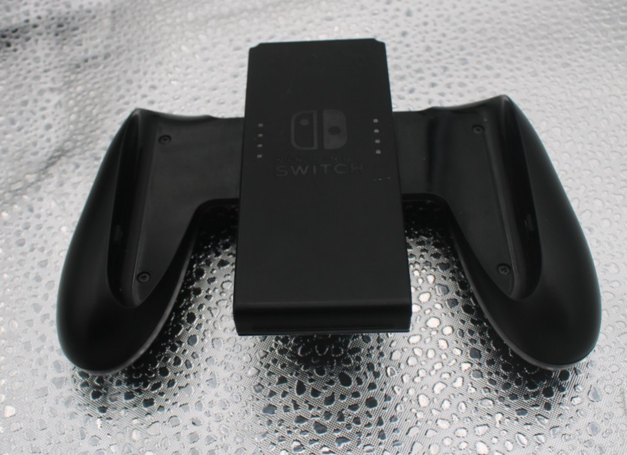 Nintendo Switch OLED Console 64GB w/ dock, cords, and JC holder *factory reset