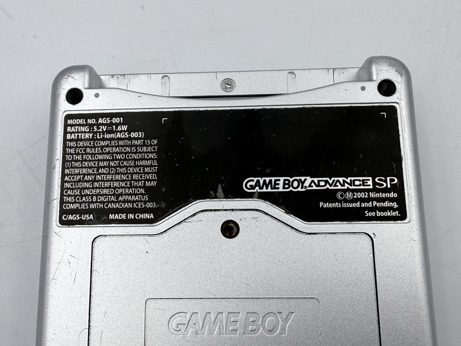 NICE 2002 Nintendo Gameboy Advance SP Silver AGS-001 w/7 Games and Accessories!