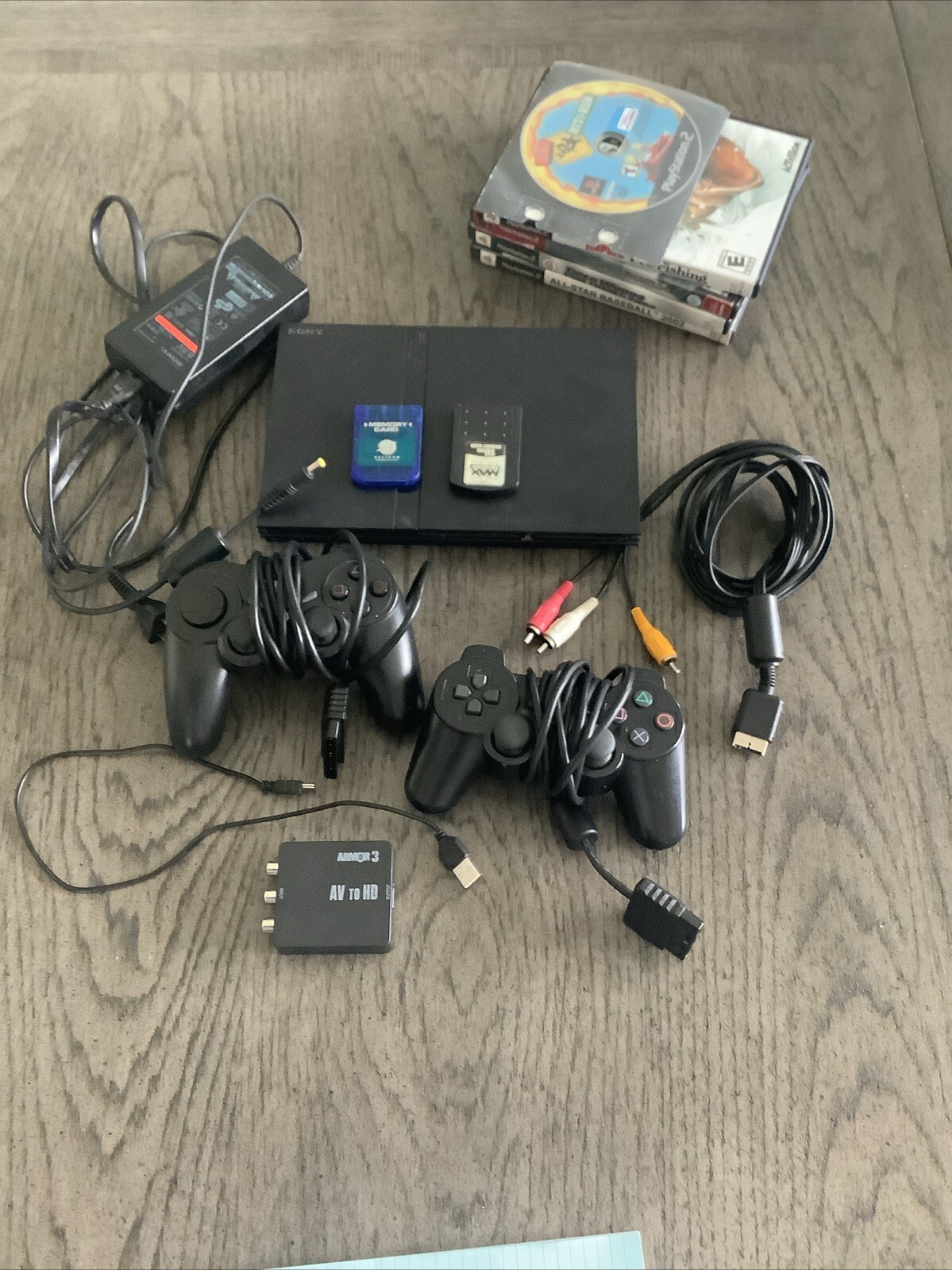 Sony PlayStation 2 Slim 2 Controllers Cables Inclu 2 Mem Cards 6 Games HDMI Adap