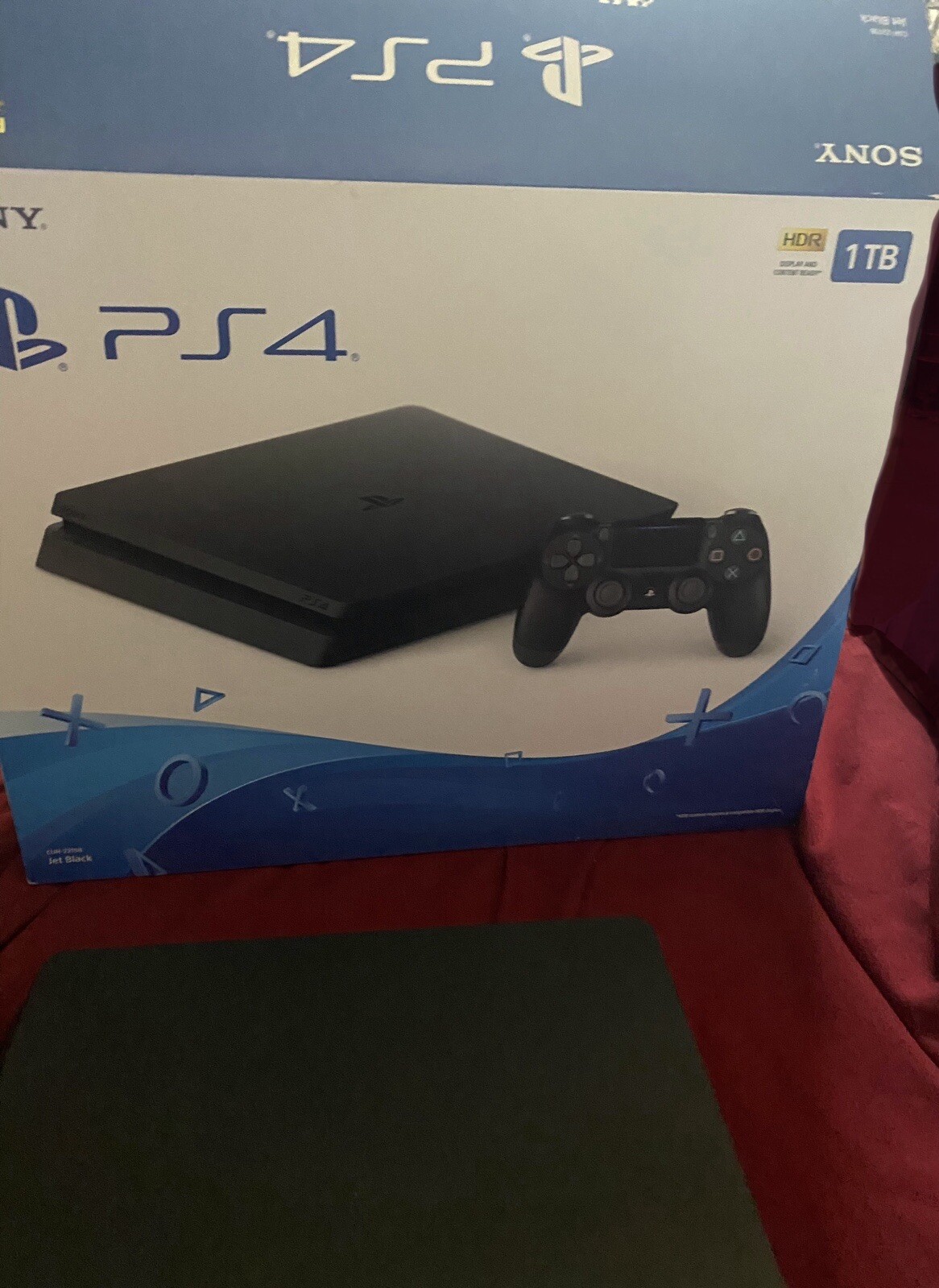 Sony PlayStation 4 Slim 1TB Console – Jet Black With 2 Controllers White & Blue