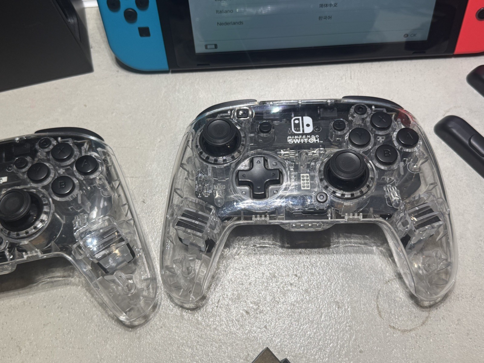 Nintendo Switch with two RGB controllers and docking station dock