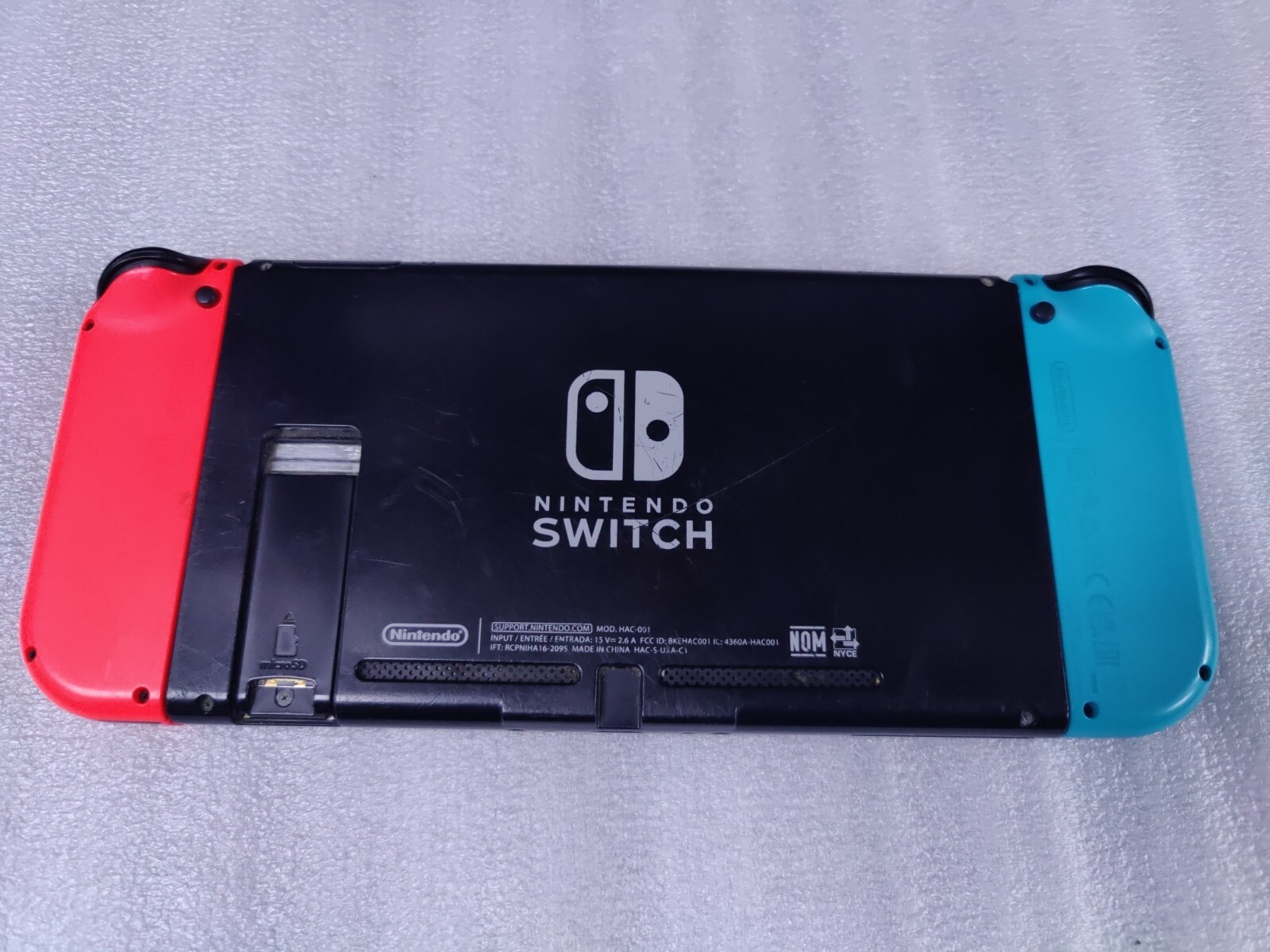 Nintendo Switch Red and Blue used (Fair) HAC-001 With Dock (No charger)
