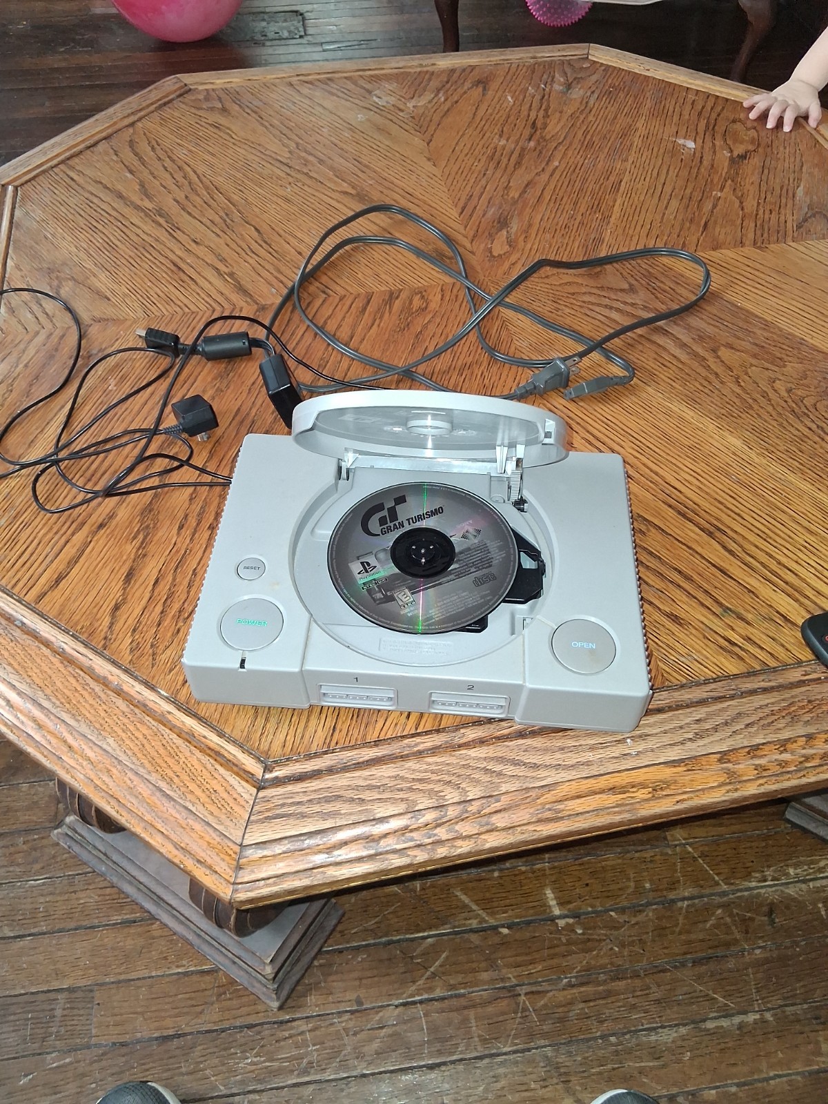 ORIGINAL Playstation 1 Console, w/cords. NO CONTOLLER. COMES WITH GRAND TURISMO