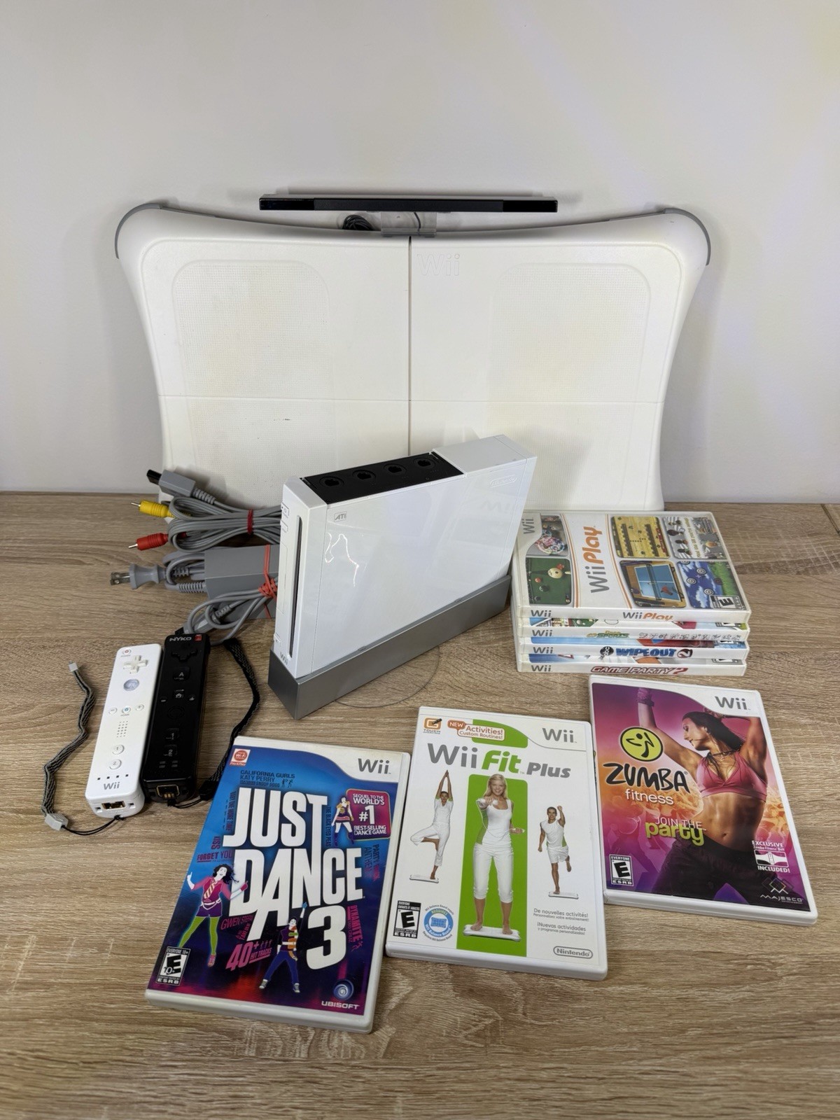 Nintendo Wii MEGA Bundle 7 Games Fit Board & 2 Wii Remotes Dance Fitness Sports