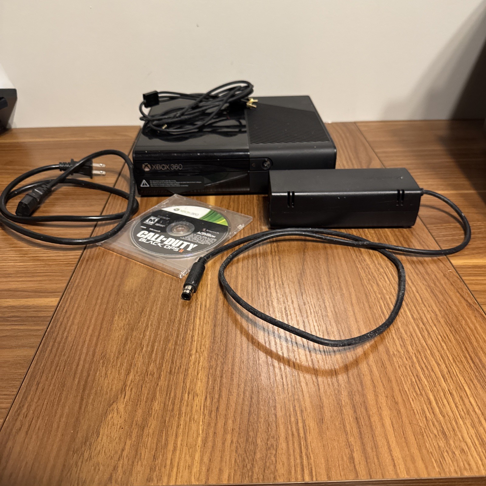 Xbox 360 E with Call of Duty Black Ops 2 Disk Only No Controler Tested