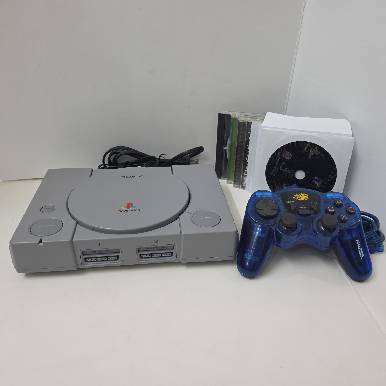 Sony Playstation 1 PS1 Console Bundle 8 Games, Remote, Power + AV Tested