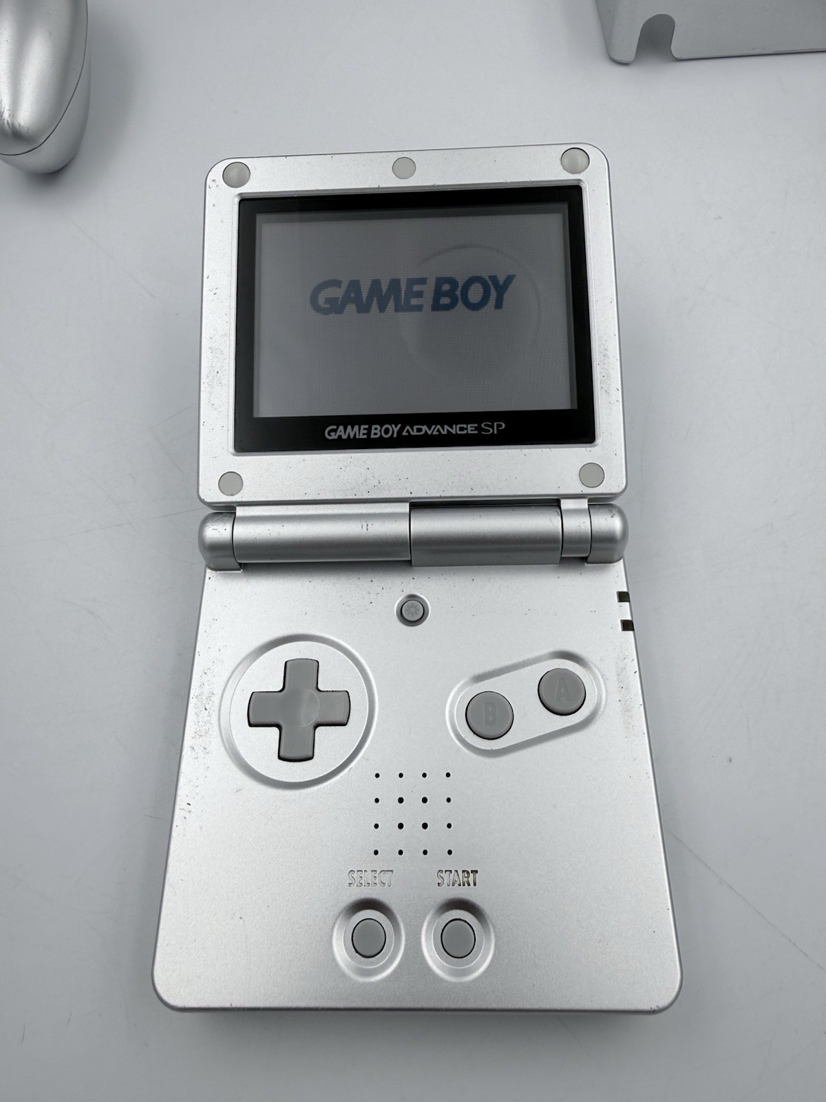 NICE 2002 Nintendo Gameboy Advance SP Silver AGS-001 w/7 Games and Accessories!