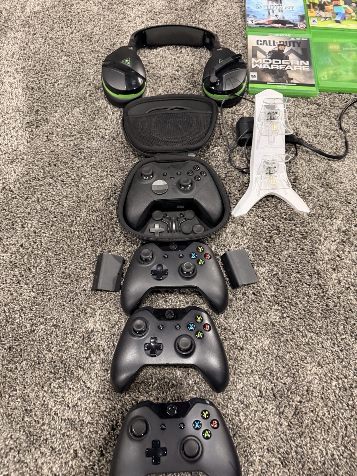 Xbox One X With 4 Controller’s With Charging Station, Headset, And Games