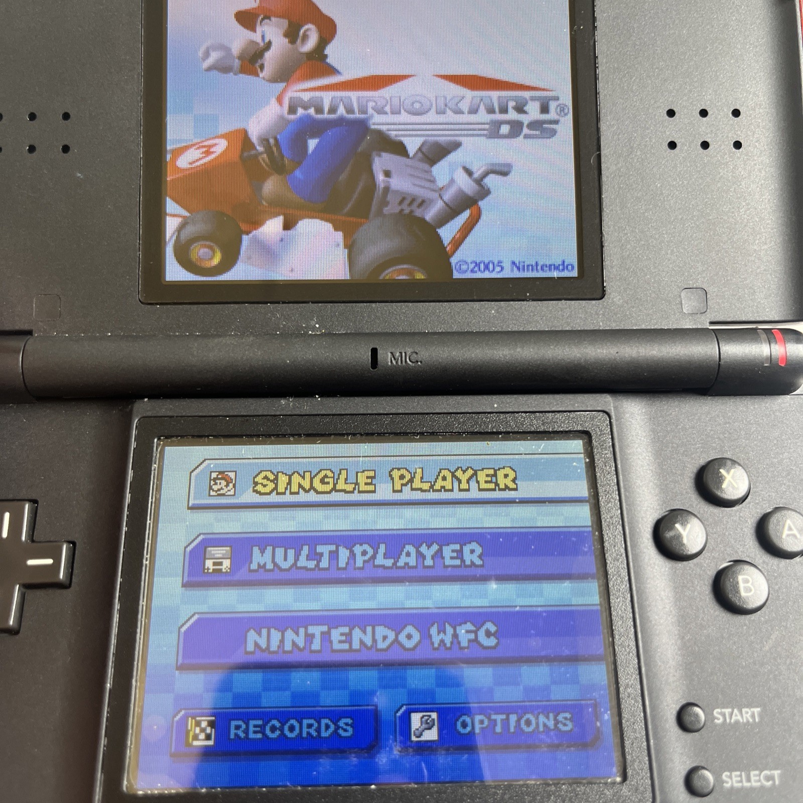 Nintendo DS Lite in Maroon with DS Lite With 5 Games