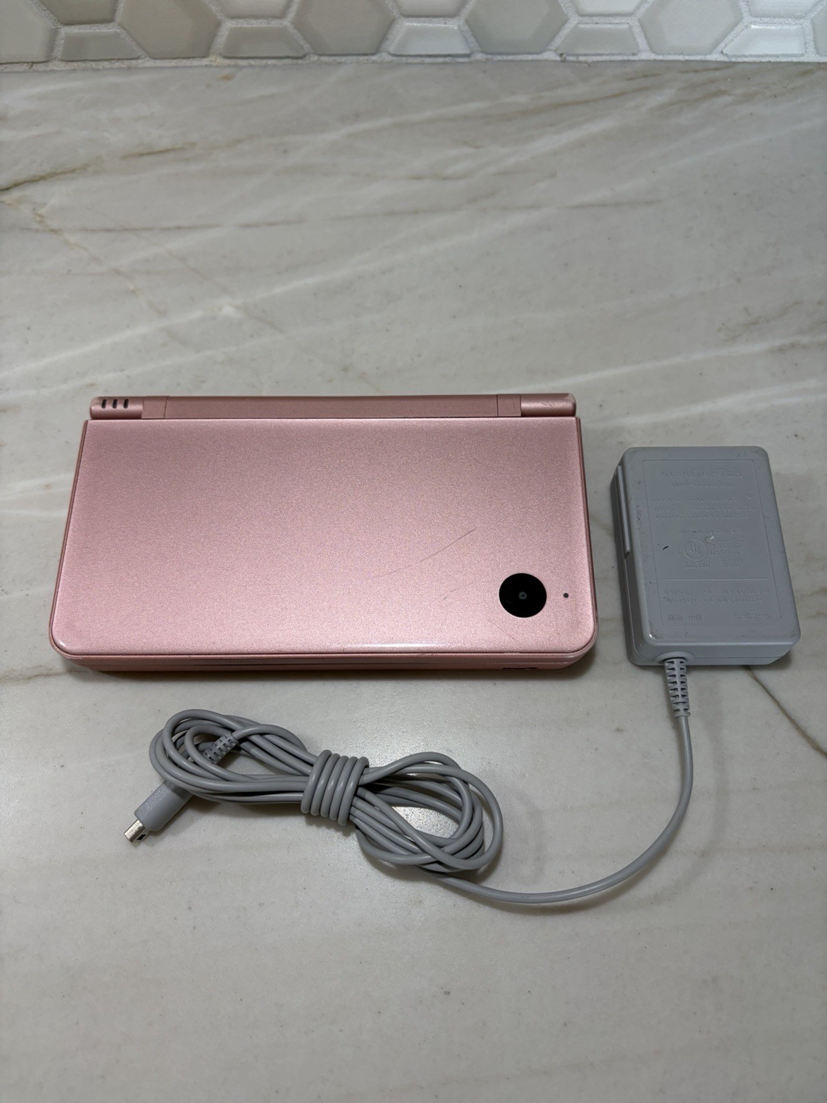 Nintendo DSi XL metallic rose Handheld System Built-in Camera NTSC Bad SD Right