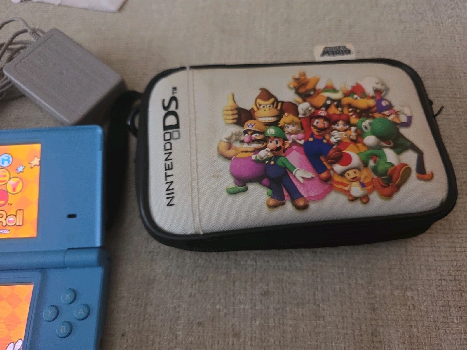 Nintendo DSi Light Blue Console Super Clean W/Stylus, Charger, Case, & Game