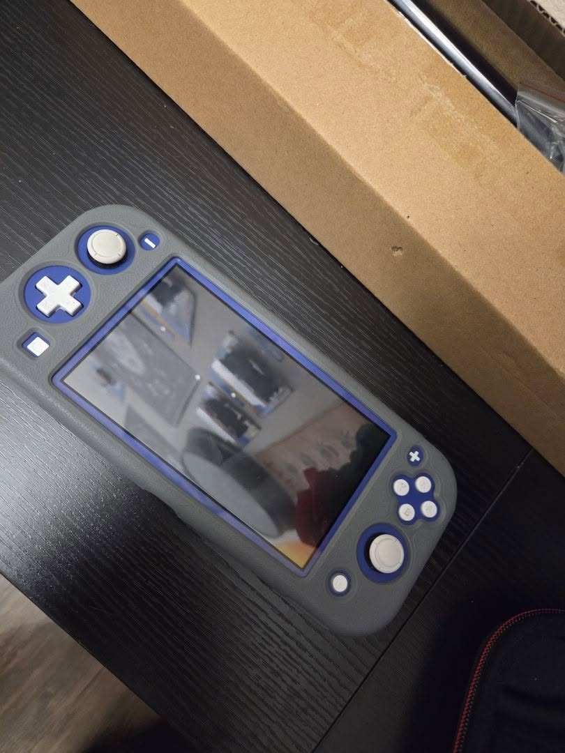 Nintendo Switch lite dark blue Handheld System with 256 gigabyte SD card