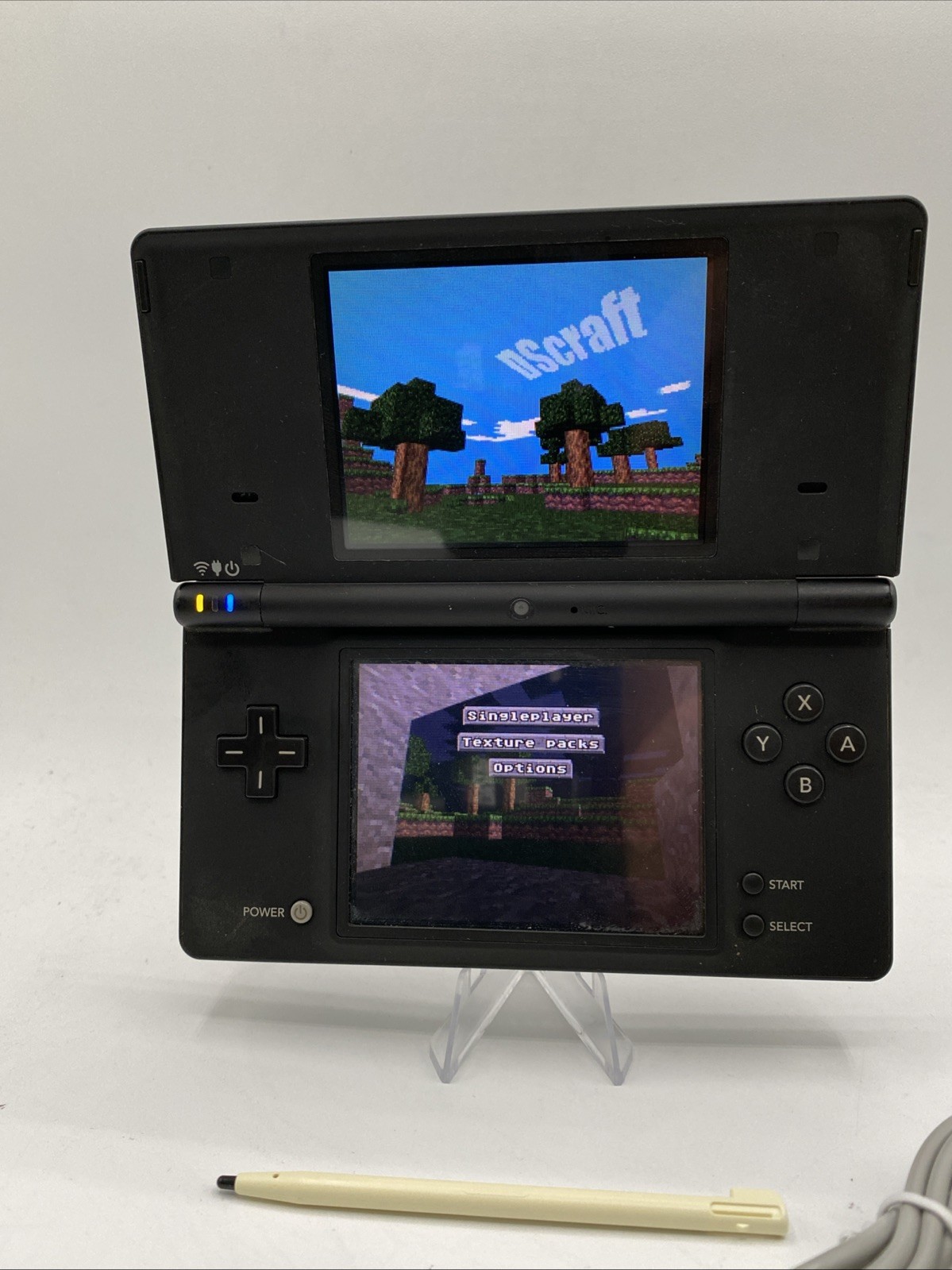 Nintendo DSi Black – Includes Preloaded Library (Large Collection)