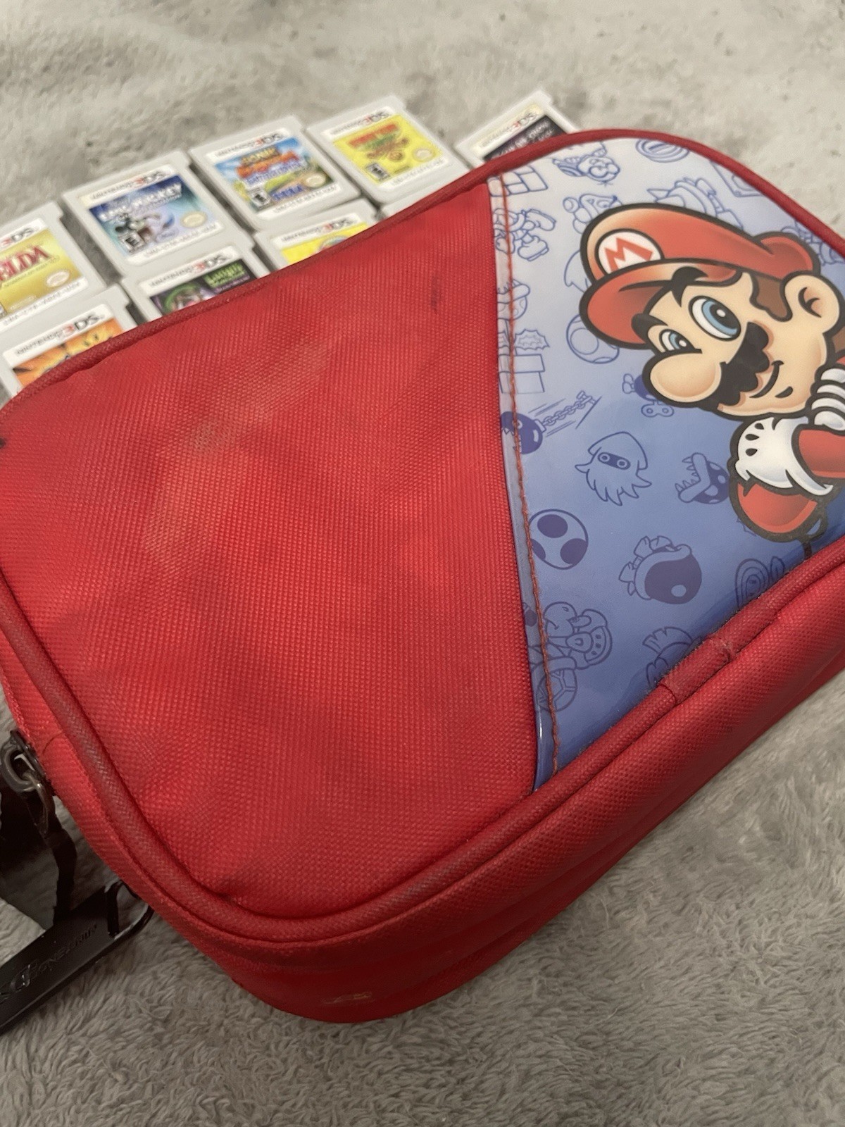 Nintendo 3DS XL (Red) with pouch and lots of games