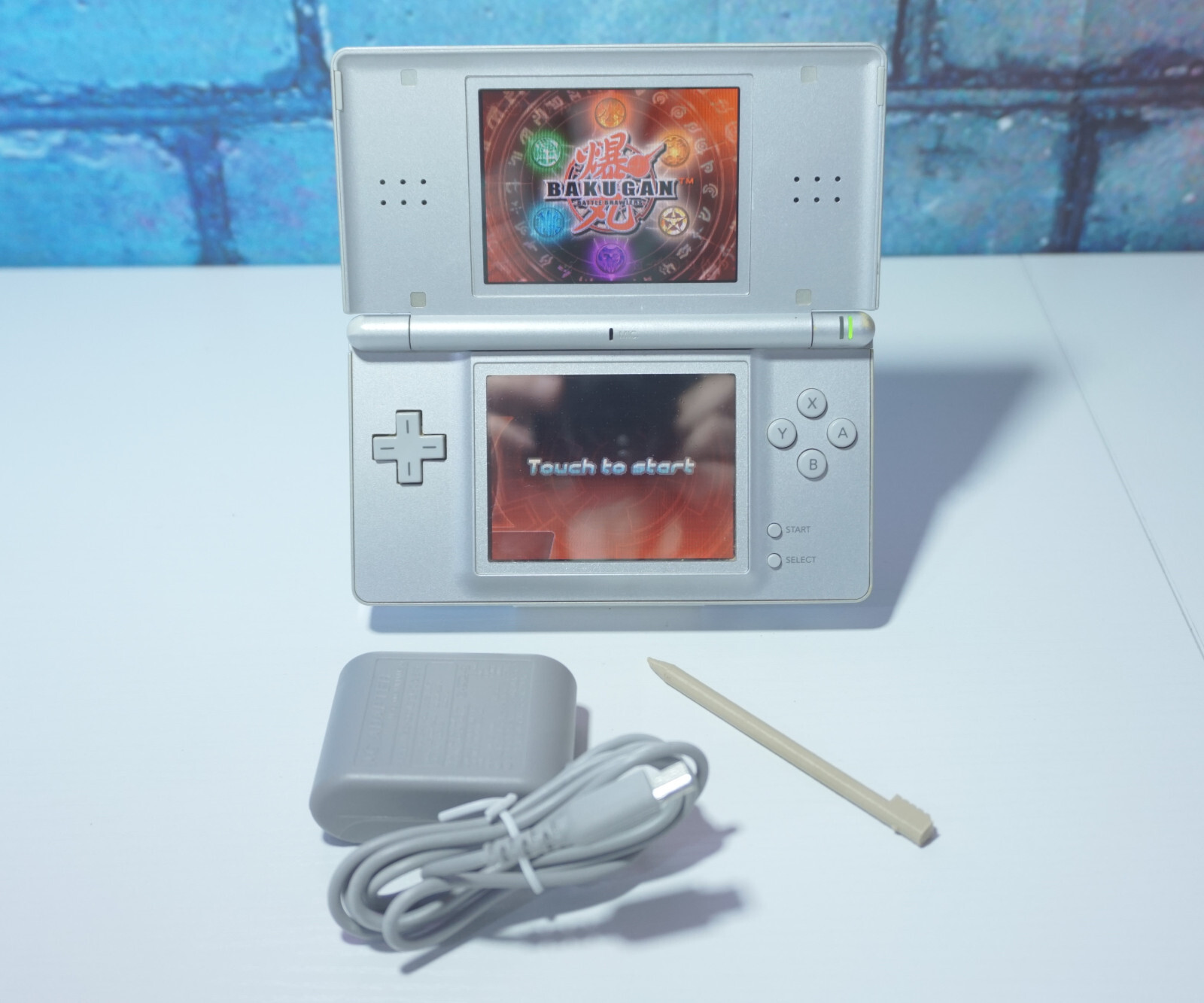 Nintendo DS Lite Launch Edition Silver Gaming System with Charger & Stylus Pen