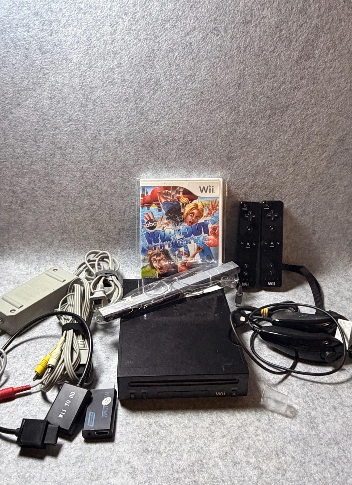 Nintendo Wii Black Console Bundle with 2 Remotes, and Wipeout The Game