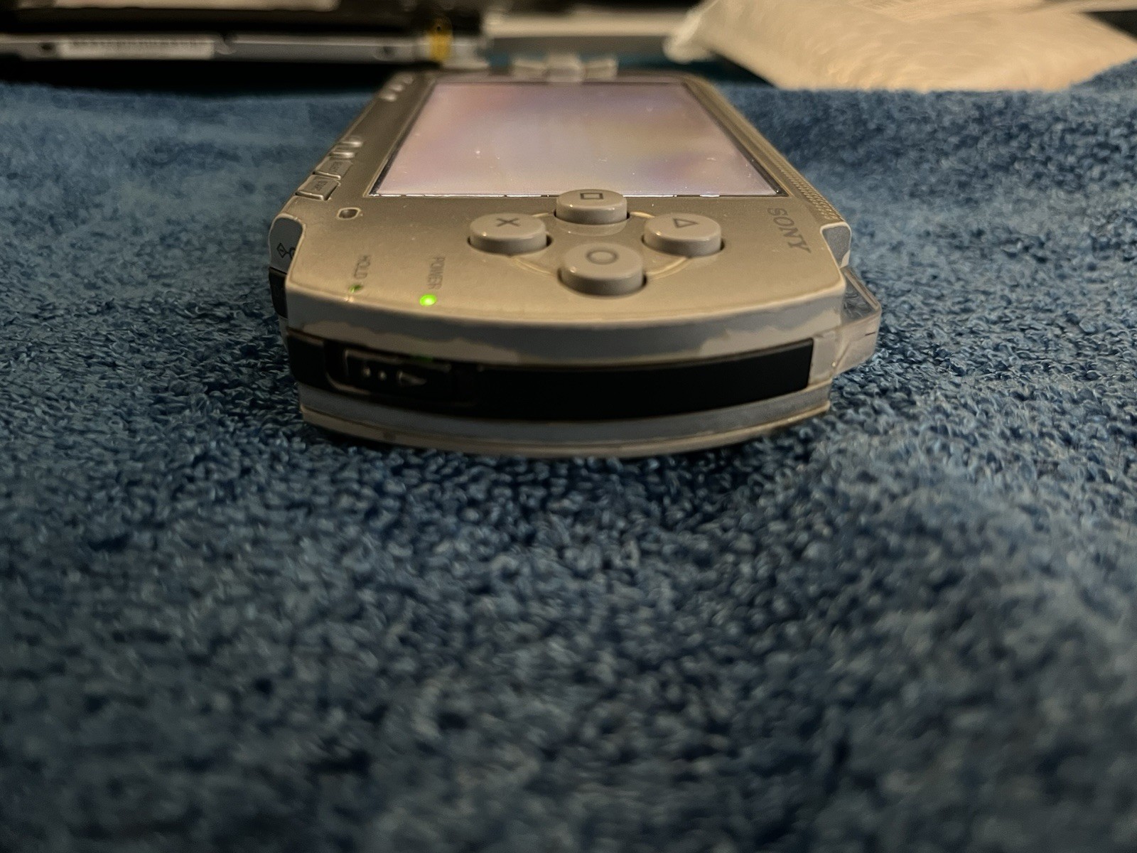 Sony PSP 1000 Silver Handheld System with Charger & Battery – ARK-4 Installed!
