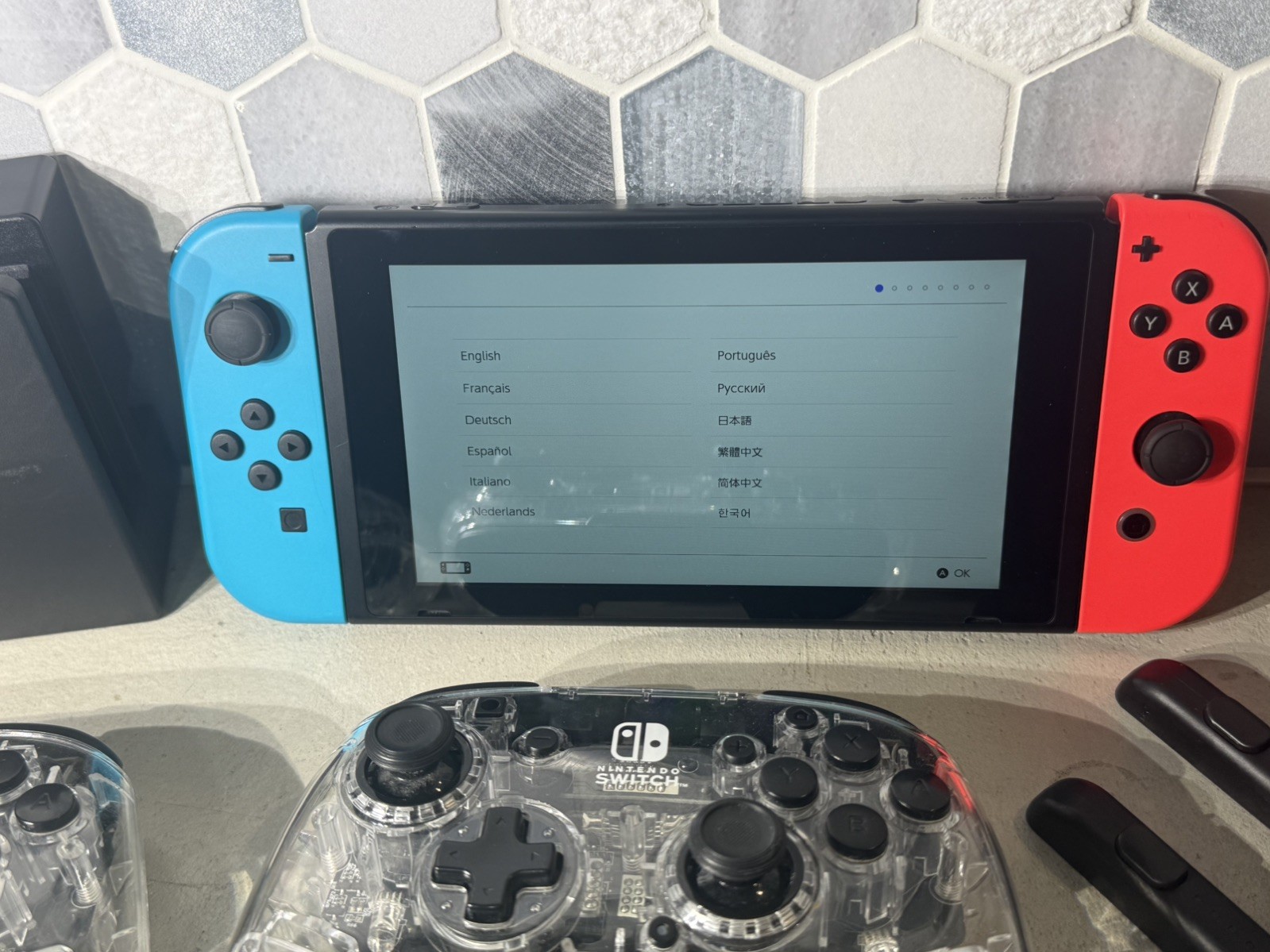 Nintendo Switch with two RGB controllers and docking station dock
