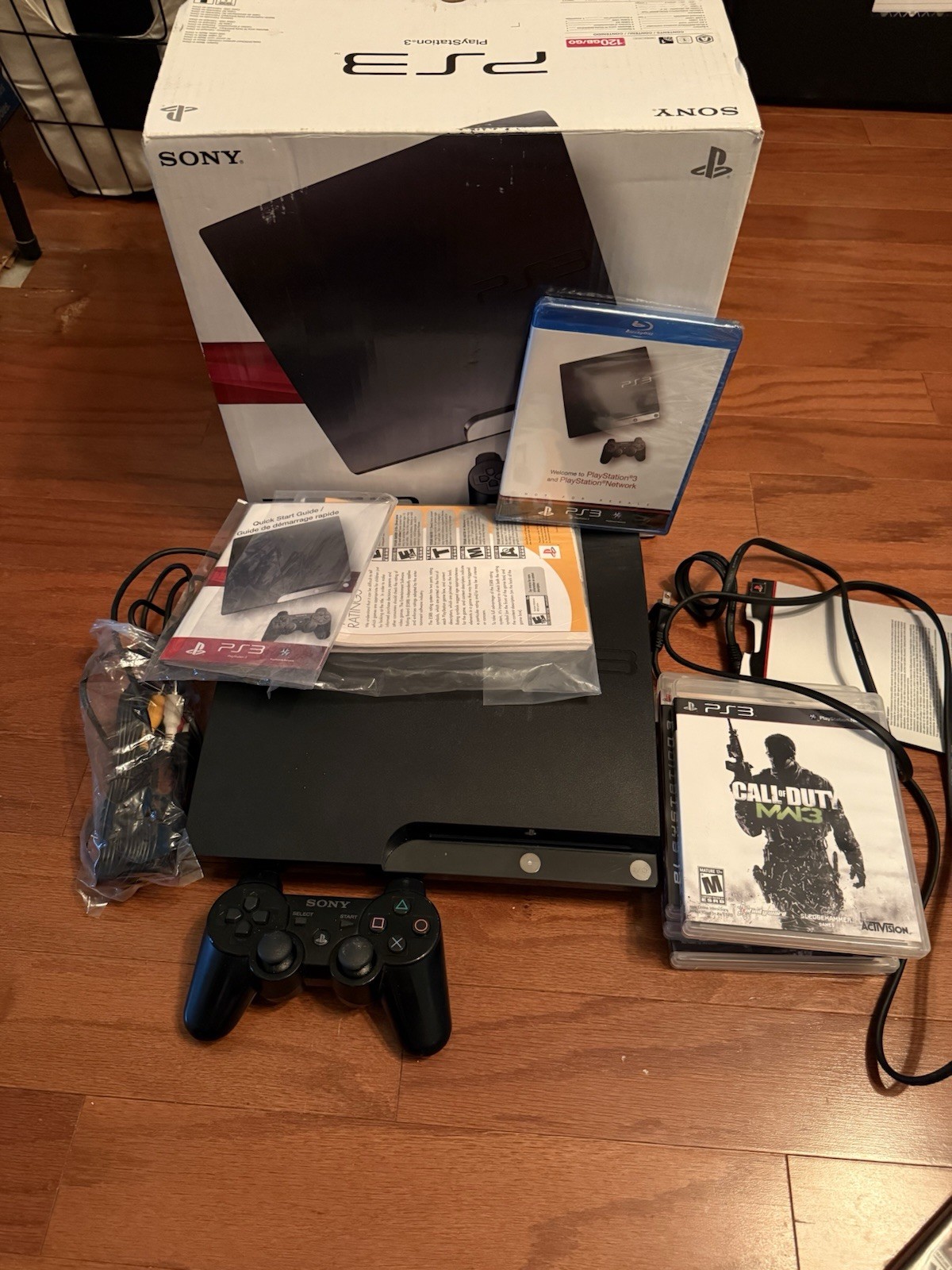Sony Playstation 3 Slim Console (COMPLETE IN BOX, EXCELLENT CONDITION) W games