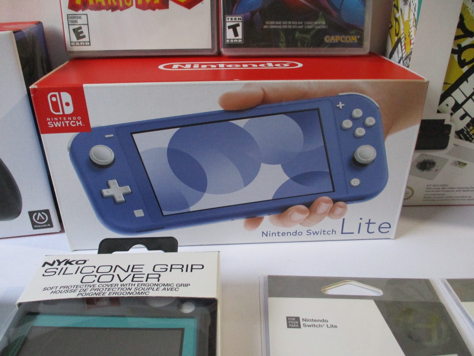 Nintendo Switch Lite – (Blue) Bundle W/ Games and Accessories All Brand New