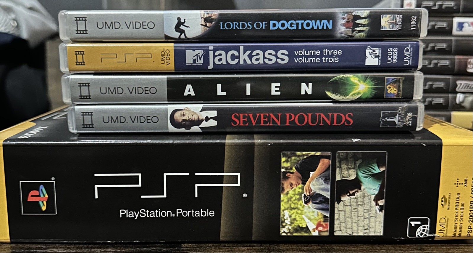 Sony Playstation PSP-2000 Console – (PSP-2001PB) Includes 9 games & 4 movies