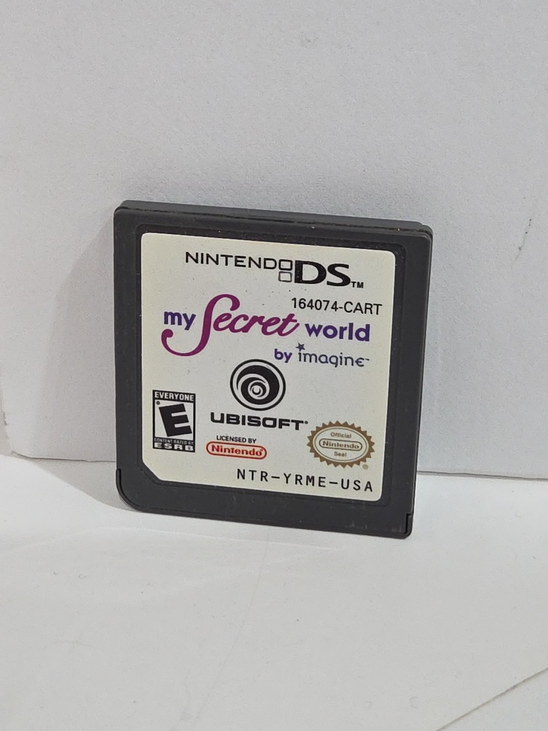 Nintendo DS Lite Console (Black) + 4 Games + Purple Case