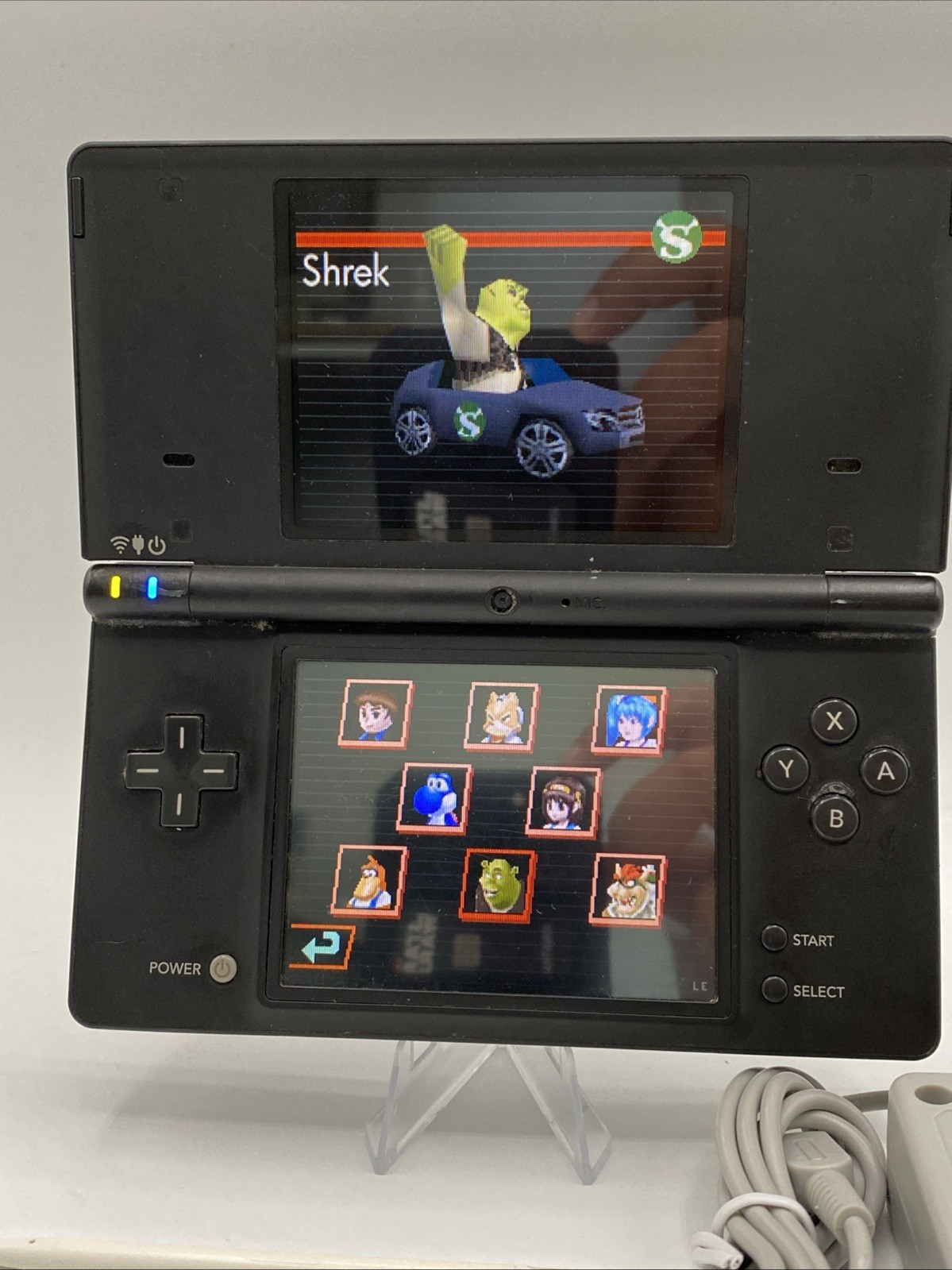 Nintendo DSi Black – Includes Preloaded Library (Large Collection)