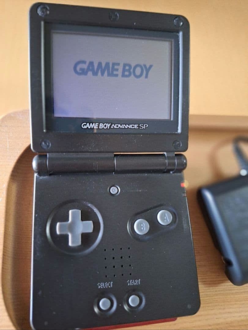 Game Boy Advance SP Console + Game Software: Pokémon Emerald X Ruby